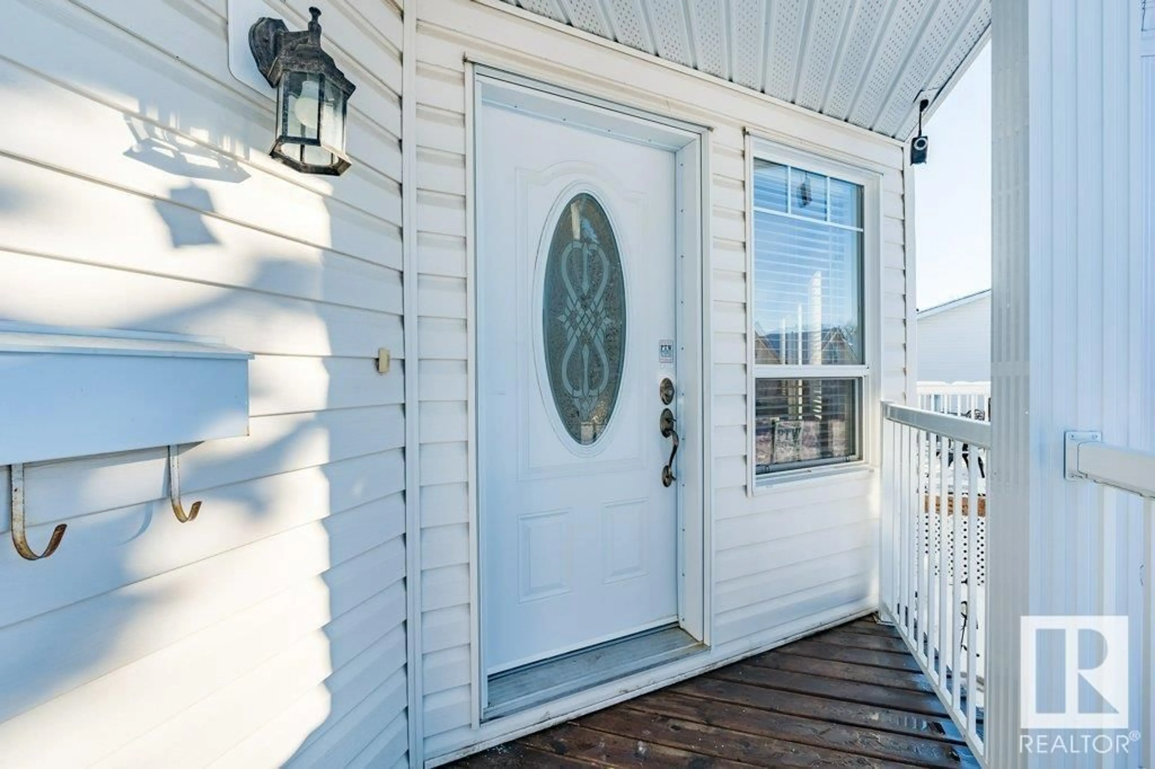 Home with vinyl exterior material, street for 39 - 4410 52 AV, Wetaskiwin Alberta T9A3M1