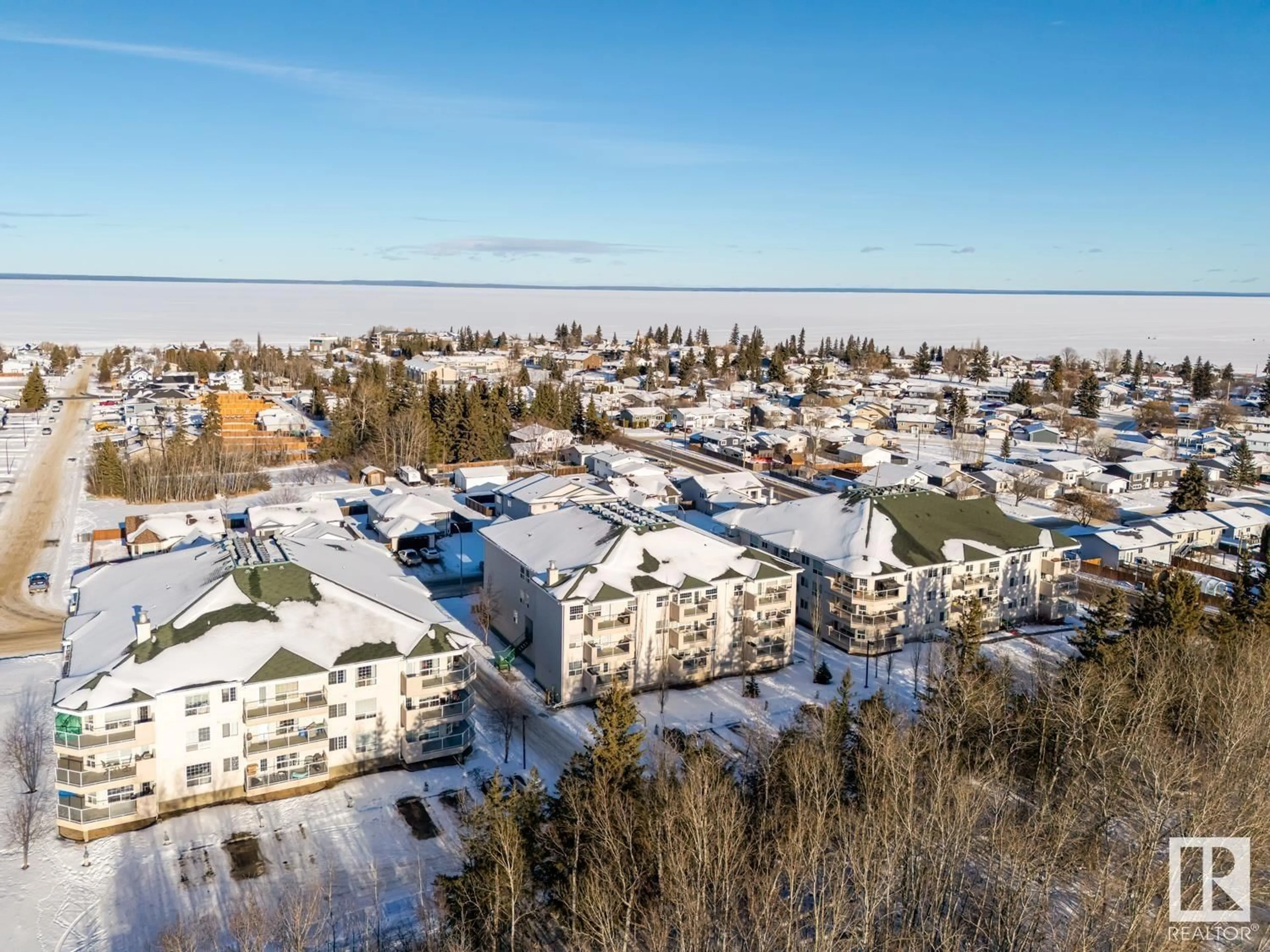 A pic from outside/outdoor area/front of a property/back of a property/a pic from drone, city buildings view from balcony for #203 1605 7 AV, Cold Lake Alberta T9M0A6