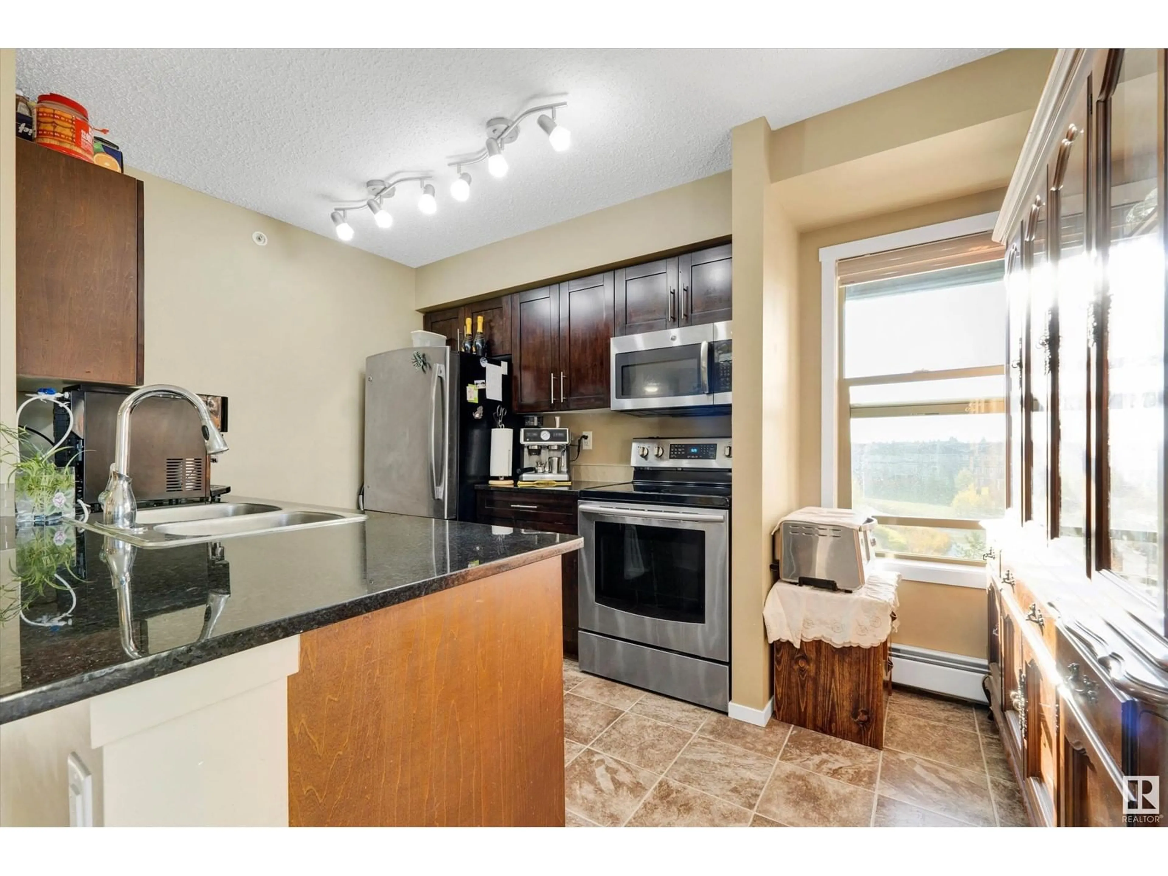 Open concept kitchen, unknown for #416 5390 CHAPPELLE RD SW, Edmonton Alberta T6W3K7