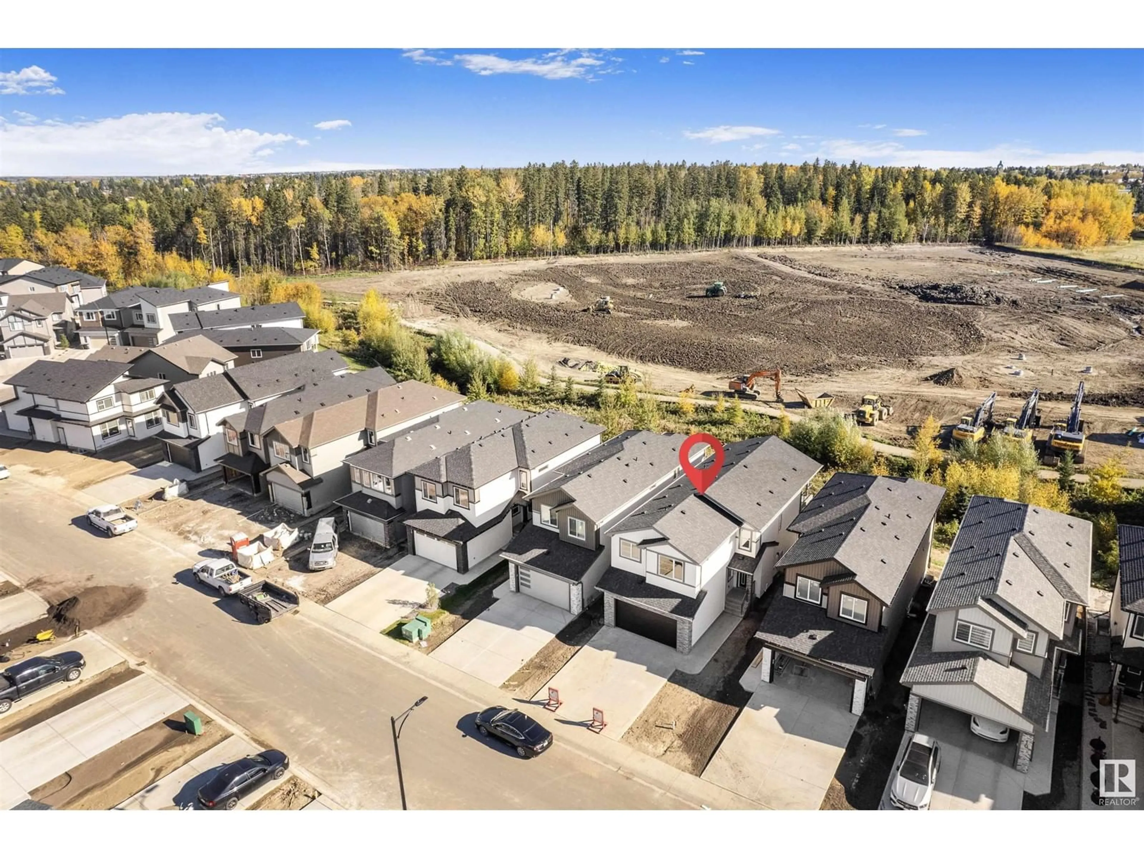 A pic from outside/outdoor area/front of a property/back of a property/a pic from drone, mountain view for 14 MEADOWBROOK WY, Spruce Grove Alberta T7X0W2