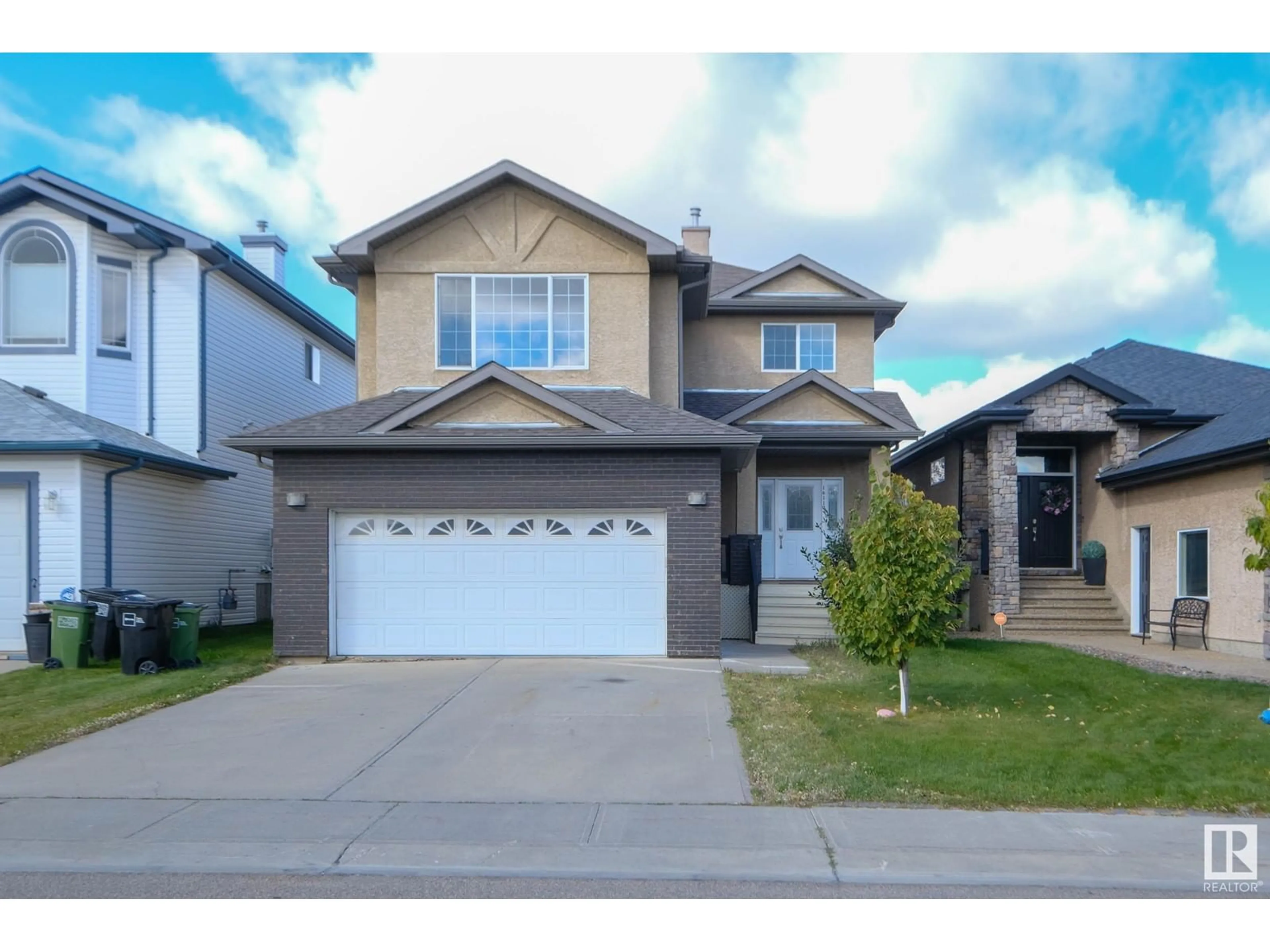 Home with vinyl exterior material, street for 16110 47 ST NW, Edmonton Alberta T5Y0G8