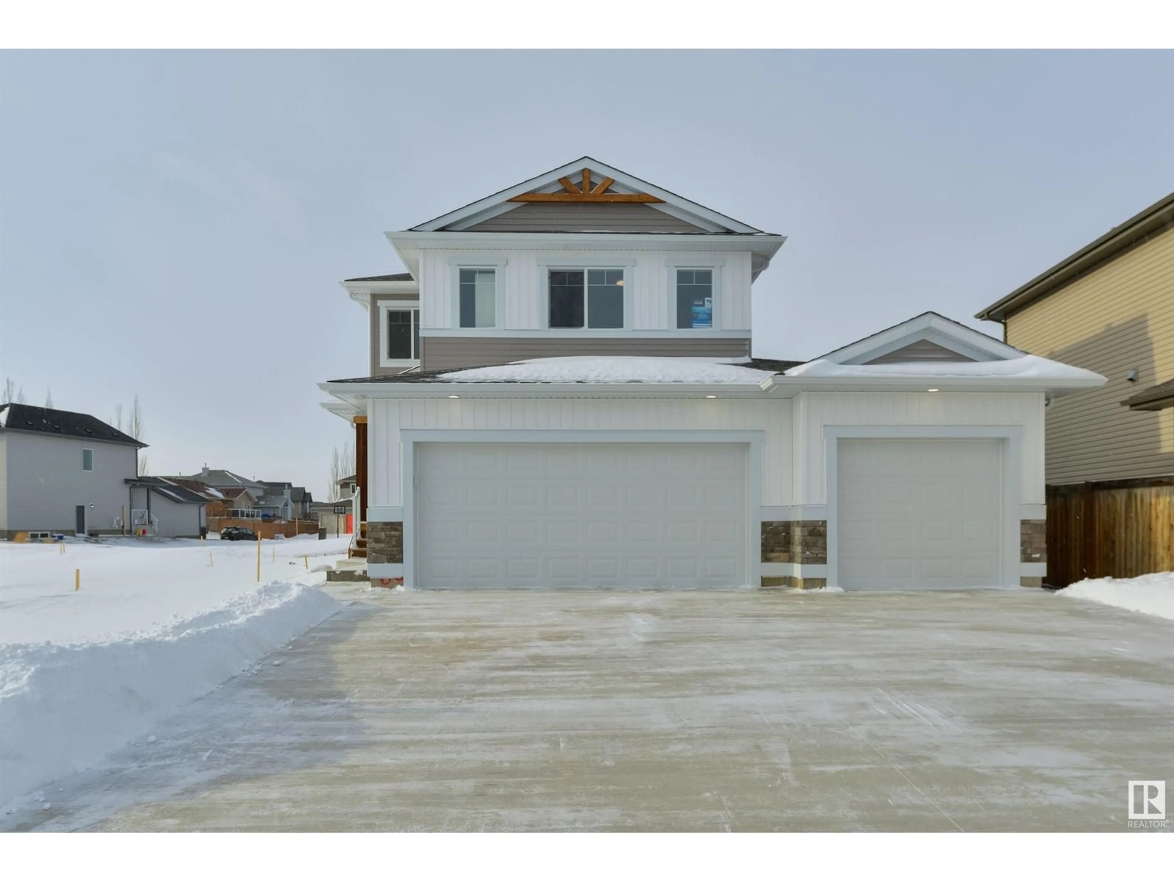 Home with vinyl exterior material, street for 63 HULL WD, Spruce Grove Alberta T7X0X5