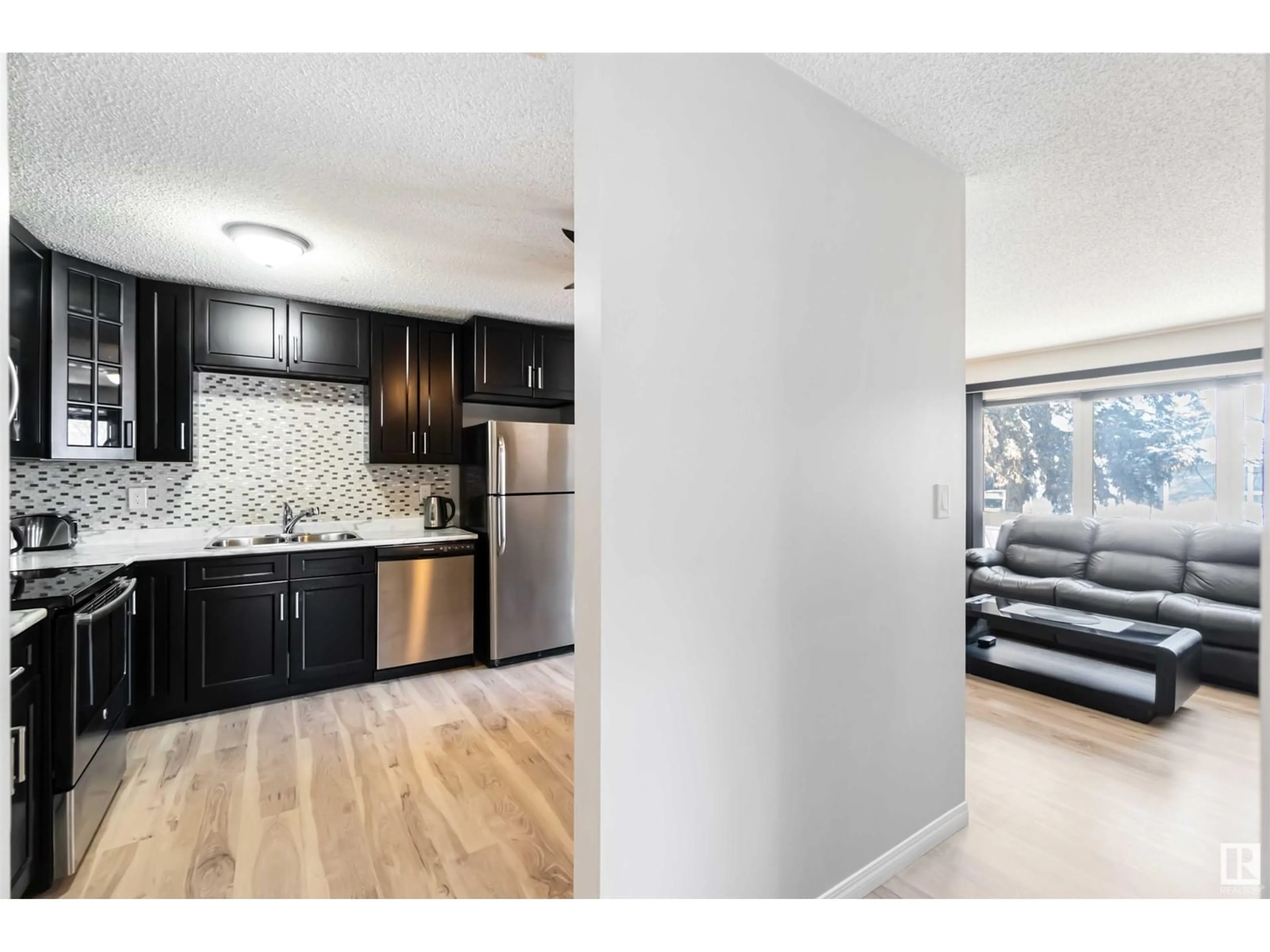 Open concept kitchen, unknown for 17047 100 ST NW, Edmonton Alberta T5X4R8