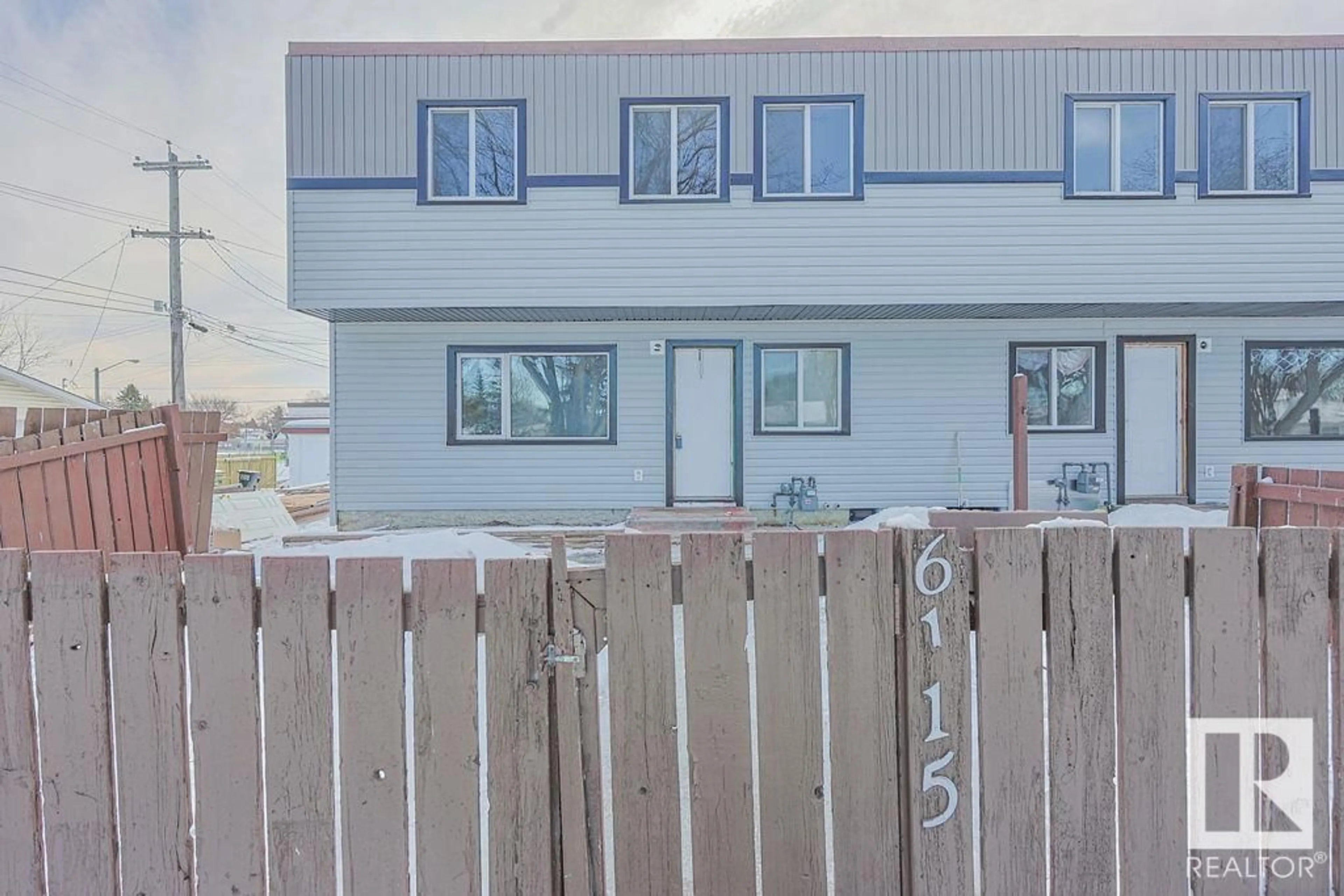 A pic from outside/outdoor area/front of a property/back of a property/a pic from drone, street for 6115 120 AV NW, Edmonton Alberta T5W1L9