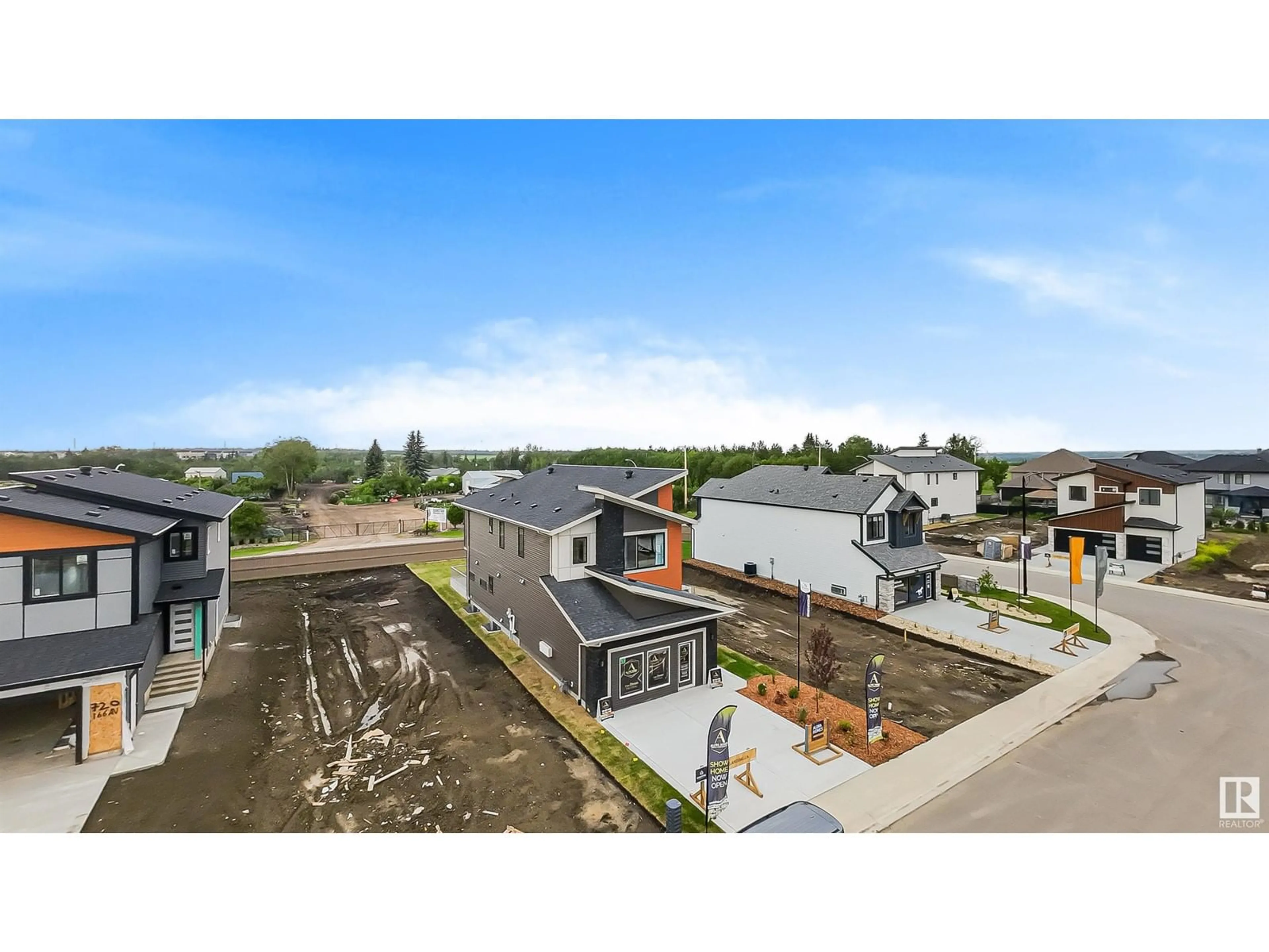 A pic from outside/outdoor area/front of a property/back of a property/a pic from drone, street for 728 166 AV NE, Edmonton Alberta T5Y4J1