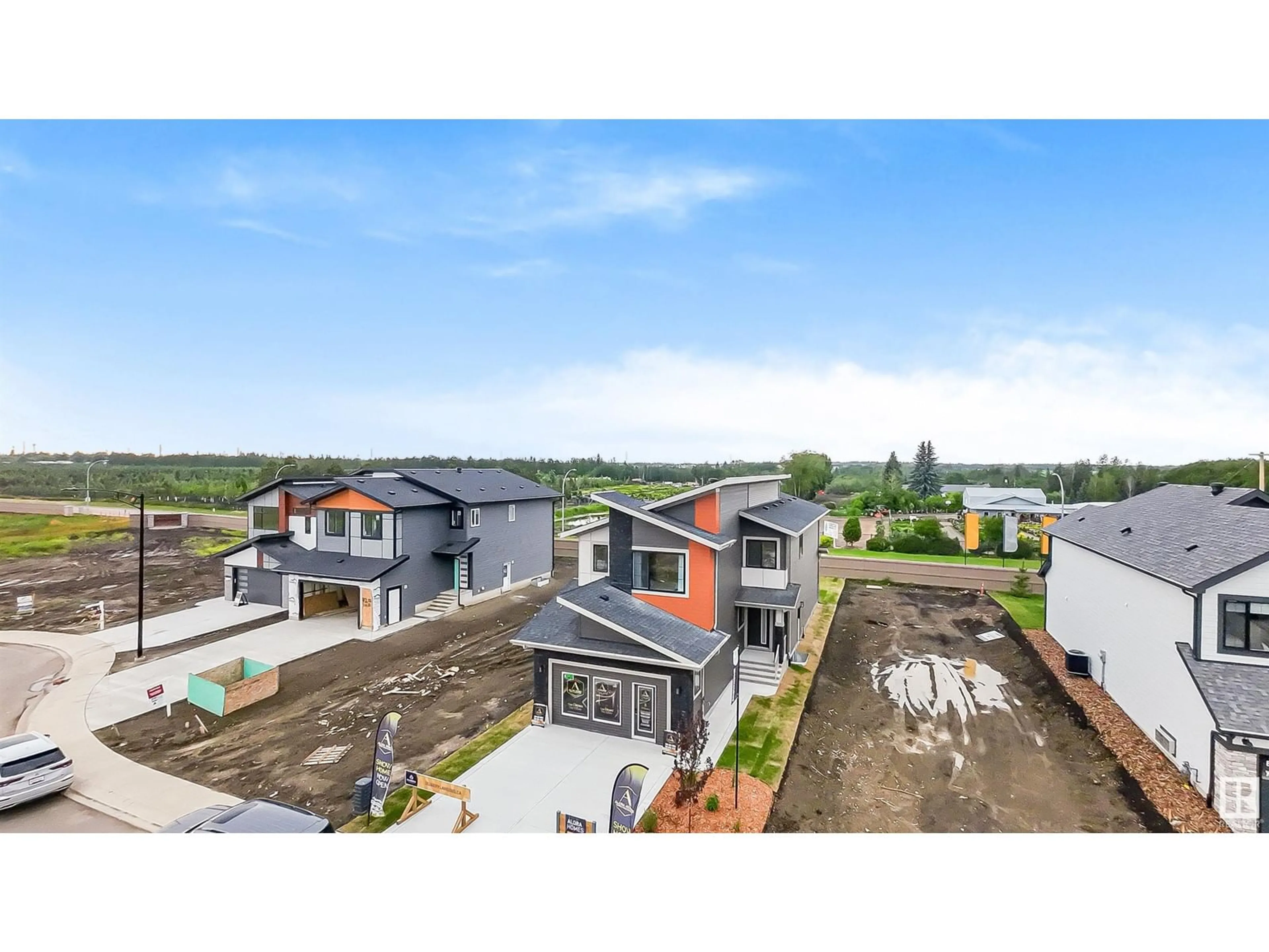 A pic from outside/outdoor area/front of a property/back of a property/a pic from drone, unknown for 728 166 AV NE, Edmonton Alberta T5Y4J1