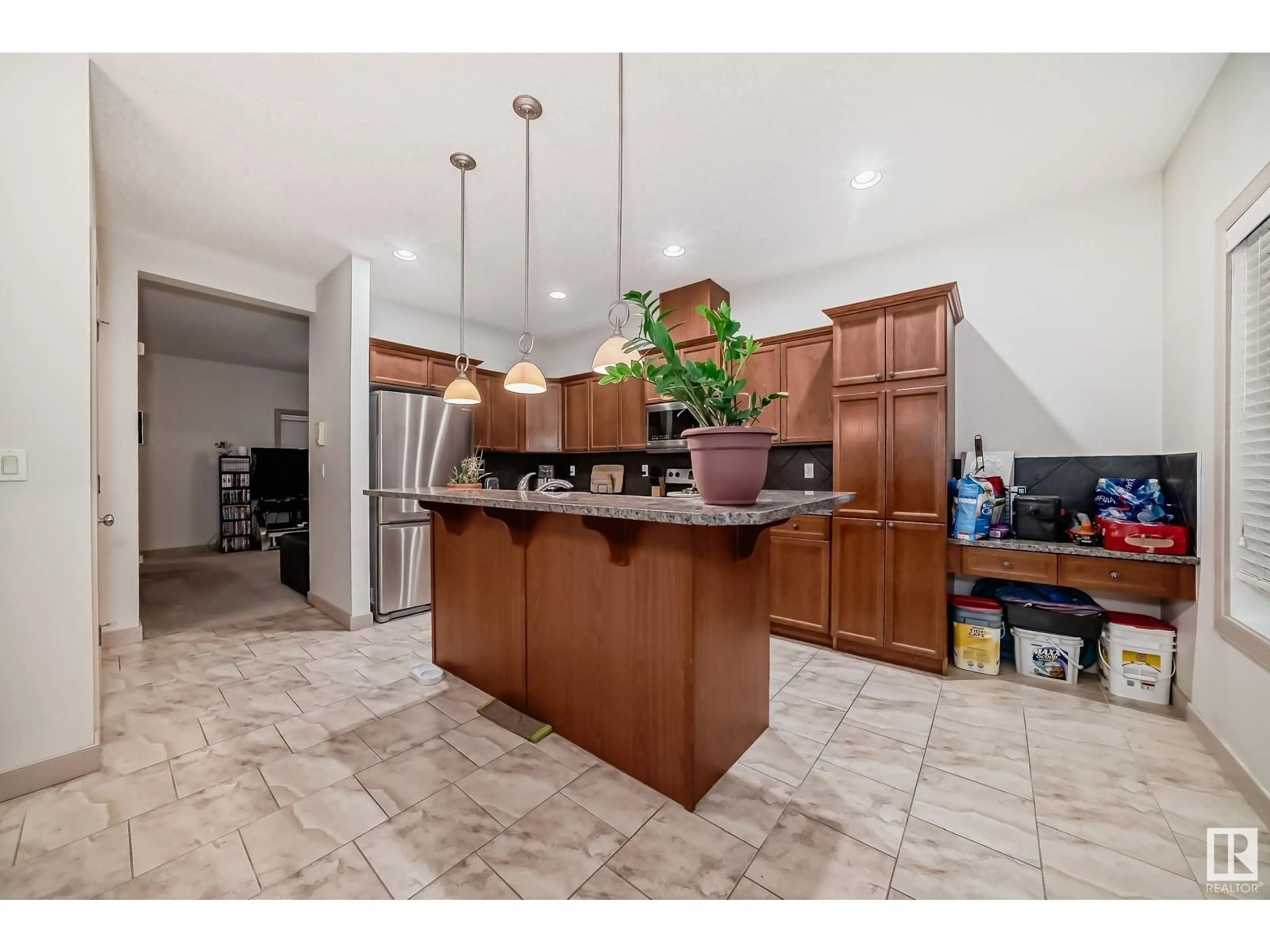 Open concept kitchen, ceramic/tile floor for #79 13825 155 AV NW NW, Edmonton Alberta T6V0B8