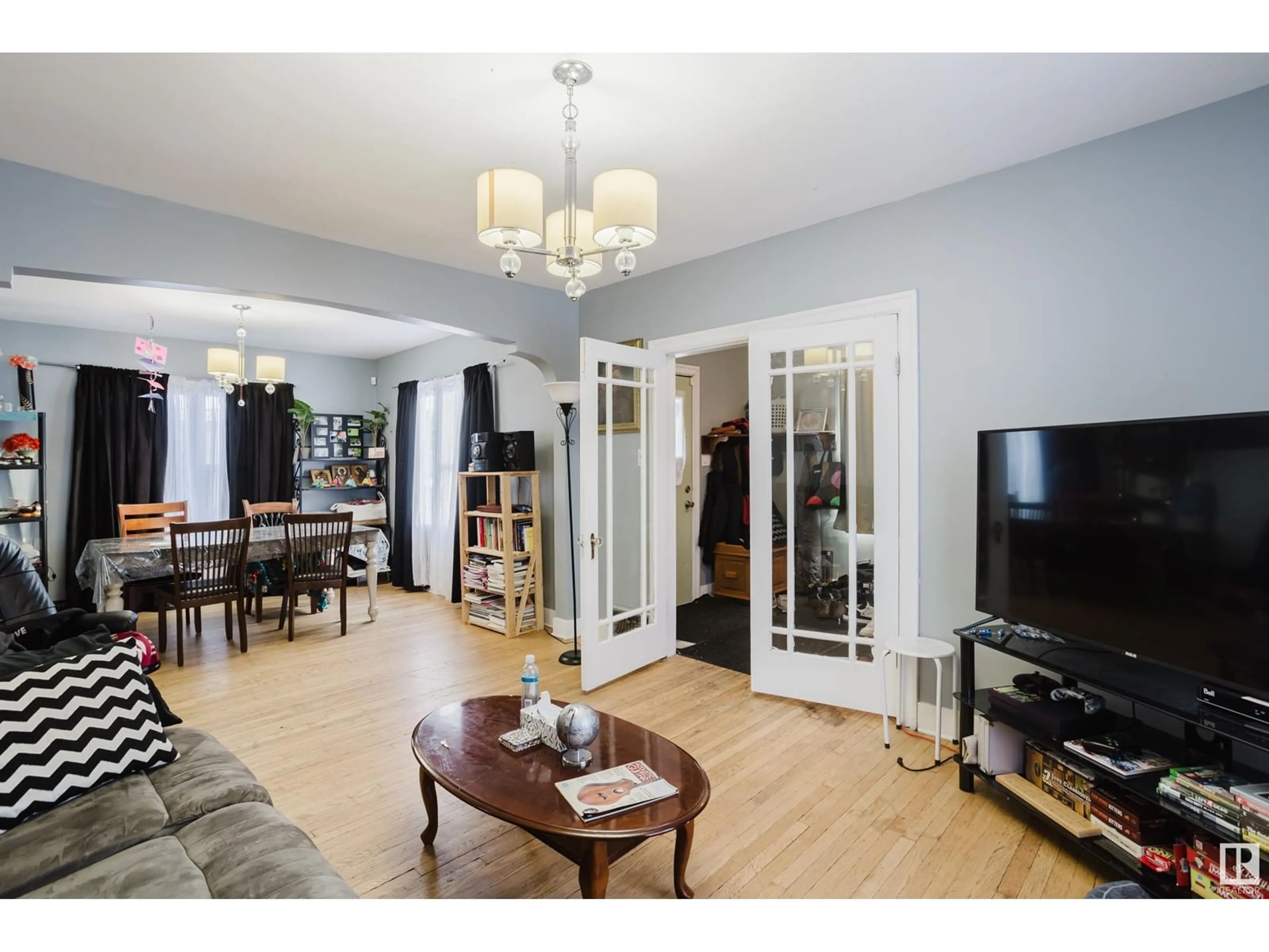 Living room with furniture, wood/laminate floor for 5304 51 AV, Wetaskiwin Alberta T9A0V6