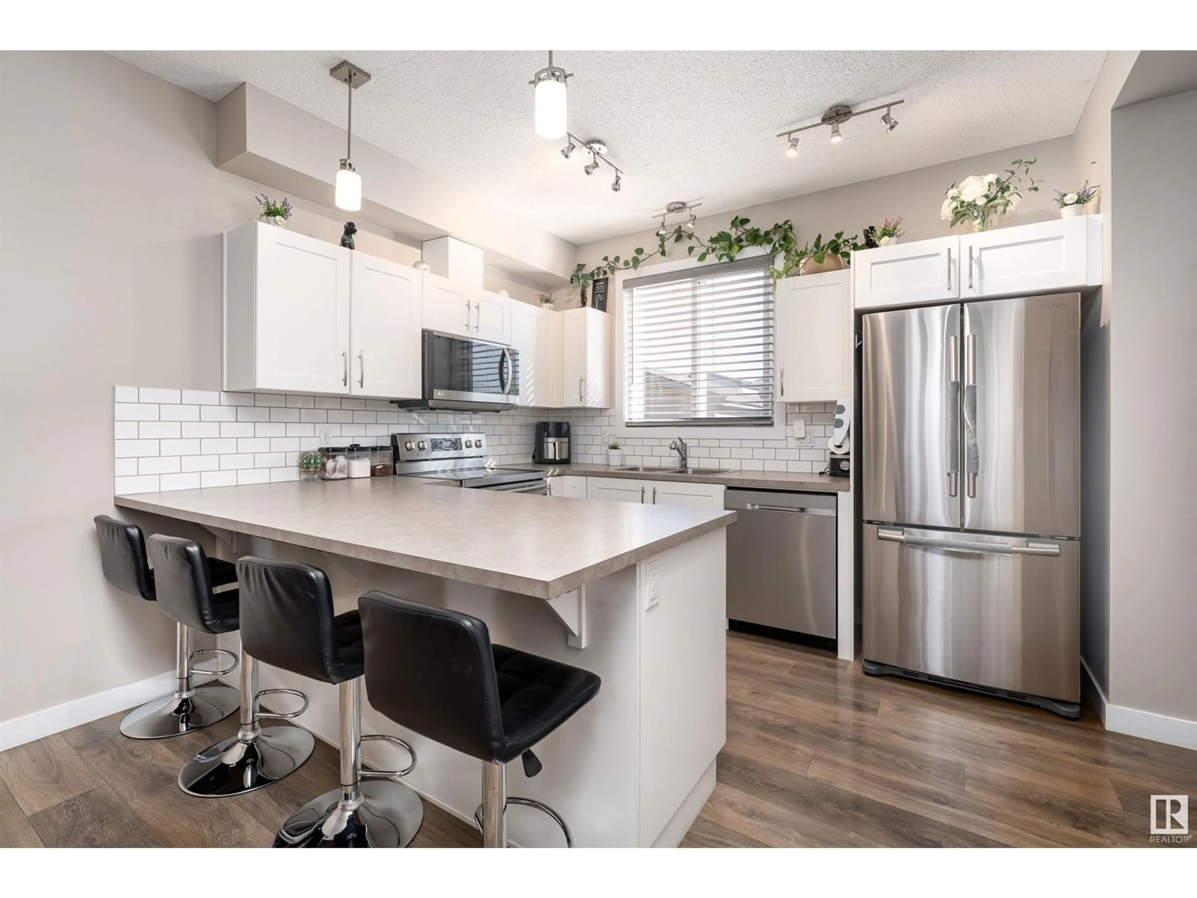 Open concept kitchen, unknown for 729 36 ST SW, Edmonton Alberta T6X2G6