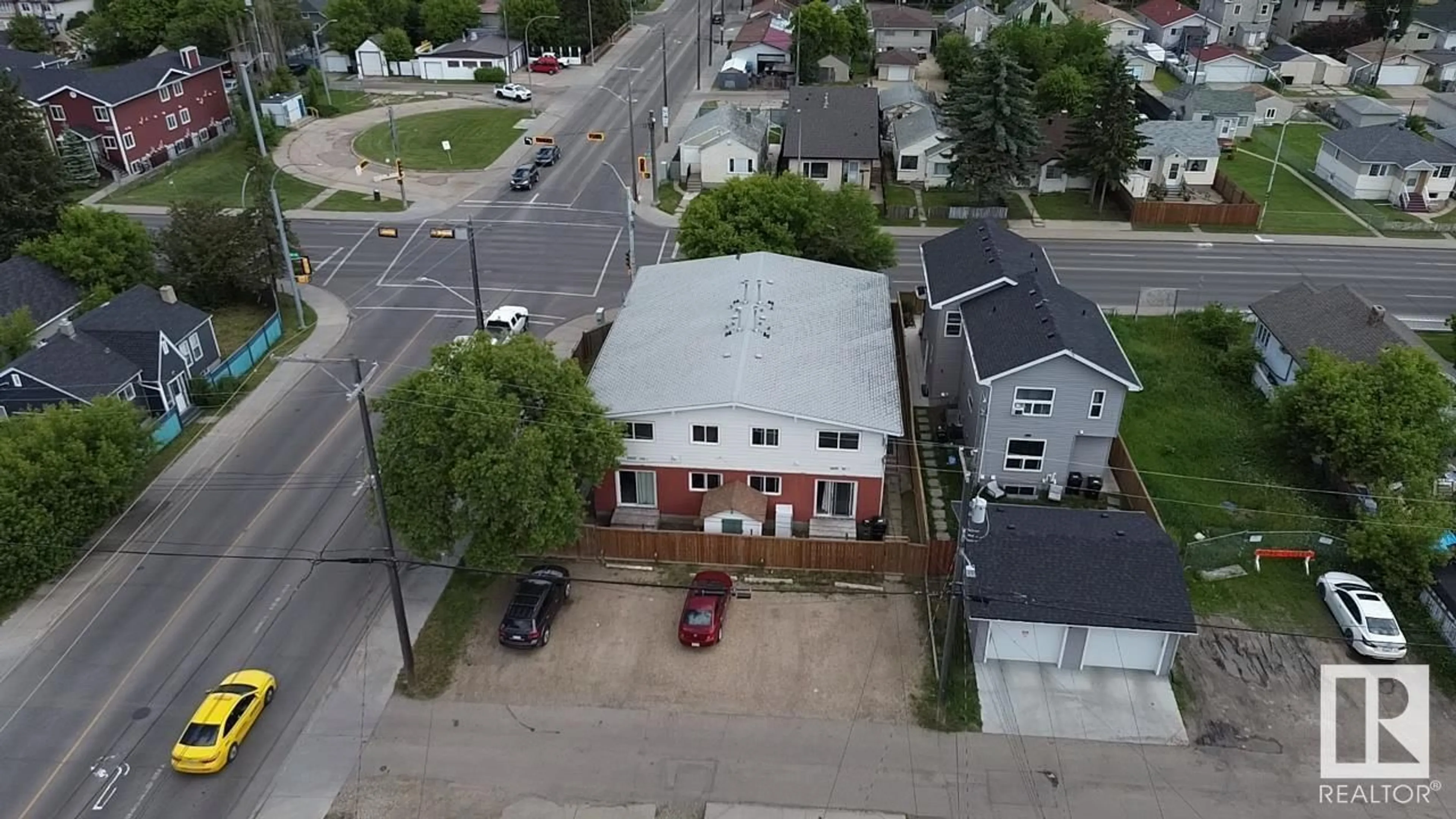 A pic from outside/outdoor area/front of a property/back of a property/a pic from drone, street for 8205 115 AV NW, Edmonton Alberta T5B4P1