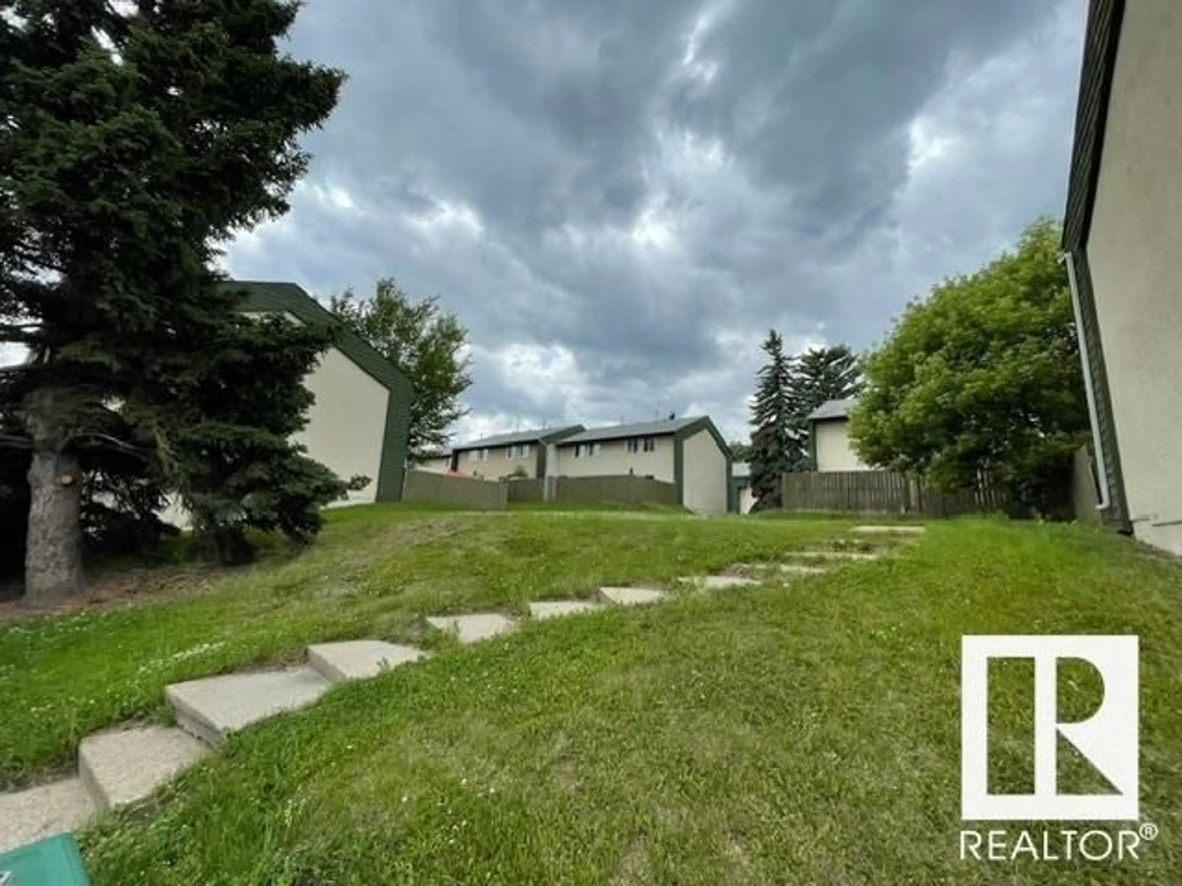 A pic from outside/outdoor area/front of a property/back of a property/a pic from drone, street for 774 ABBOTTSFIELD RD NW, Edmonton Alberta T5W4R4