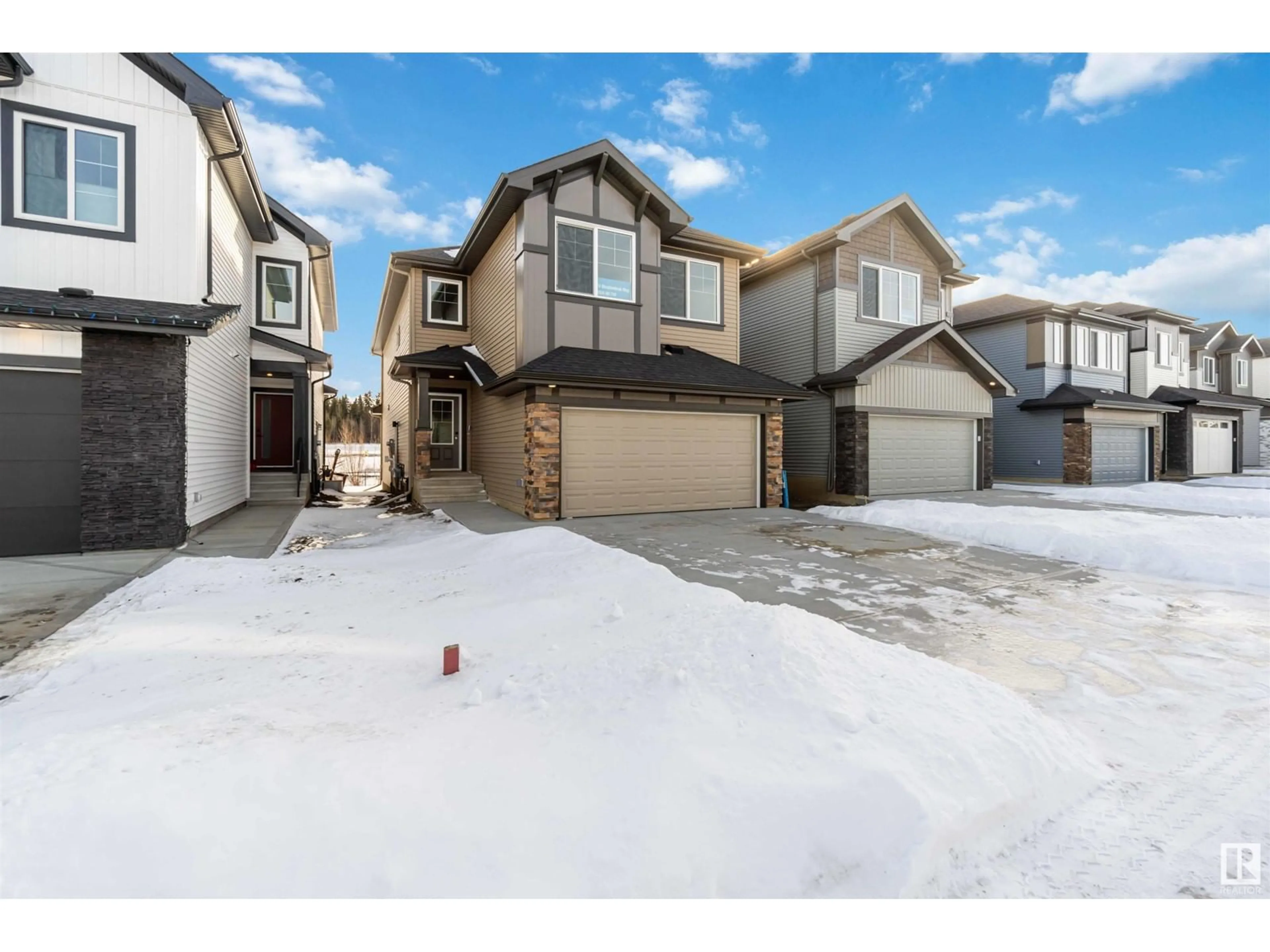 A pic from outside/outdoor area/front of a property/back of a property/a pic from drone, street for 24 Meadowbrook WY, Spruce Grove Alberta T7X0W2