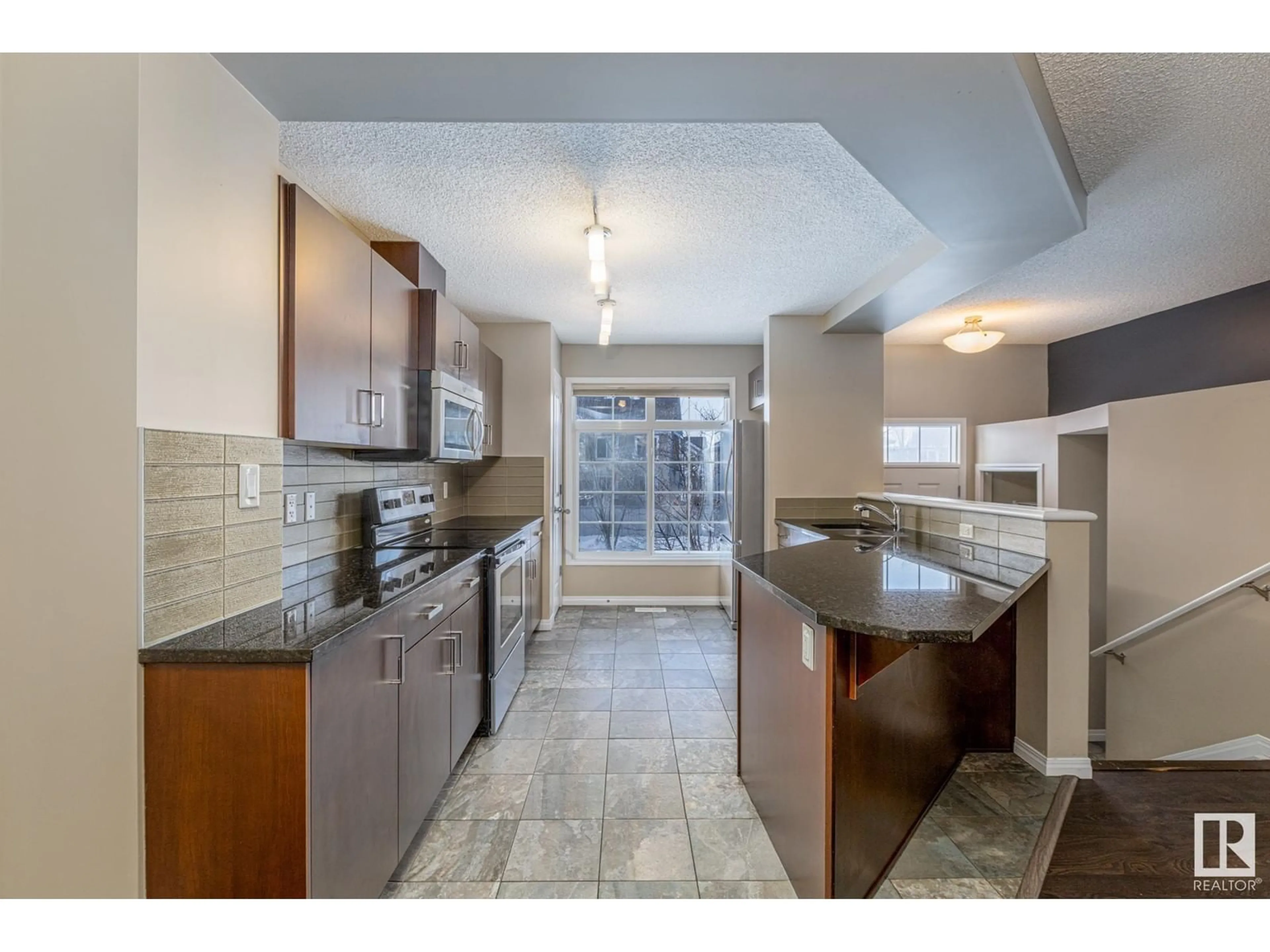 Open concept kitchen, ceramic/tile floor for 9165 SHAW WY SW, Edmonton Alberta T6X1W7