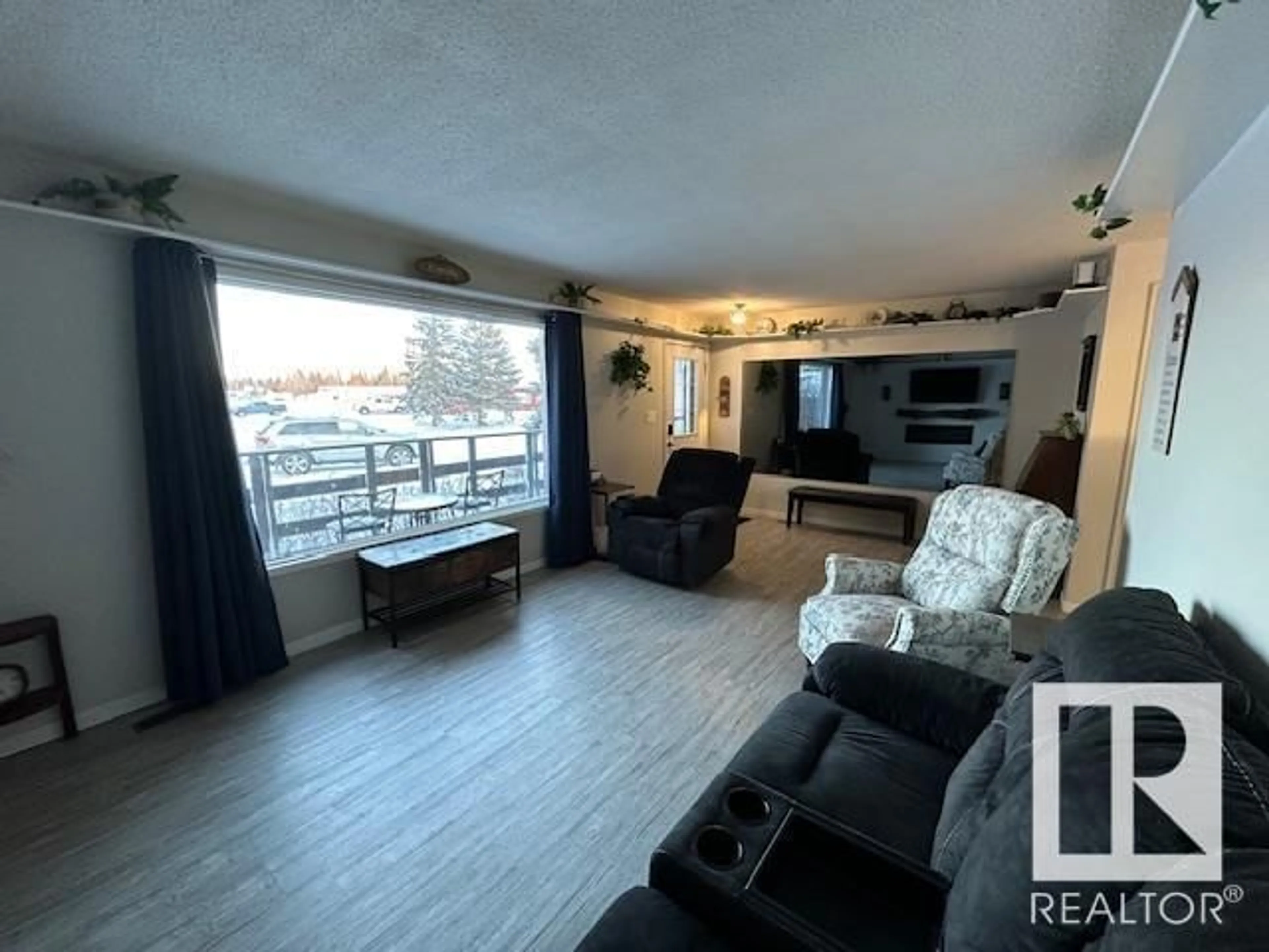 Living room with furniture, unknown for 4828 50A St, Rural Lac Ste. Anne County Alberta T0E0A0