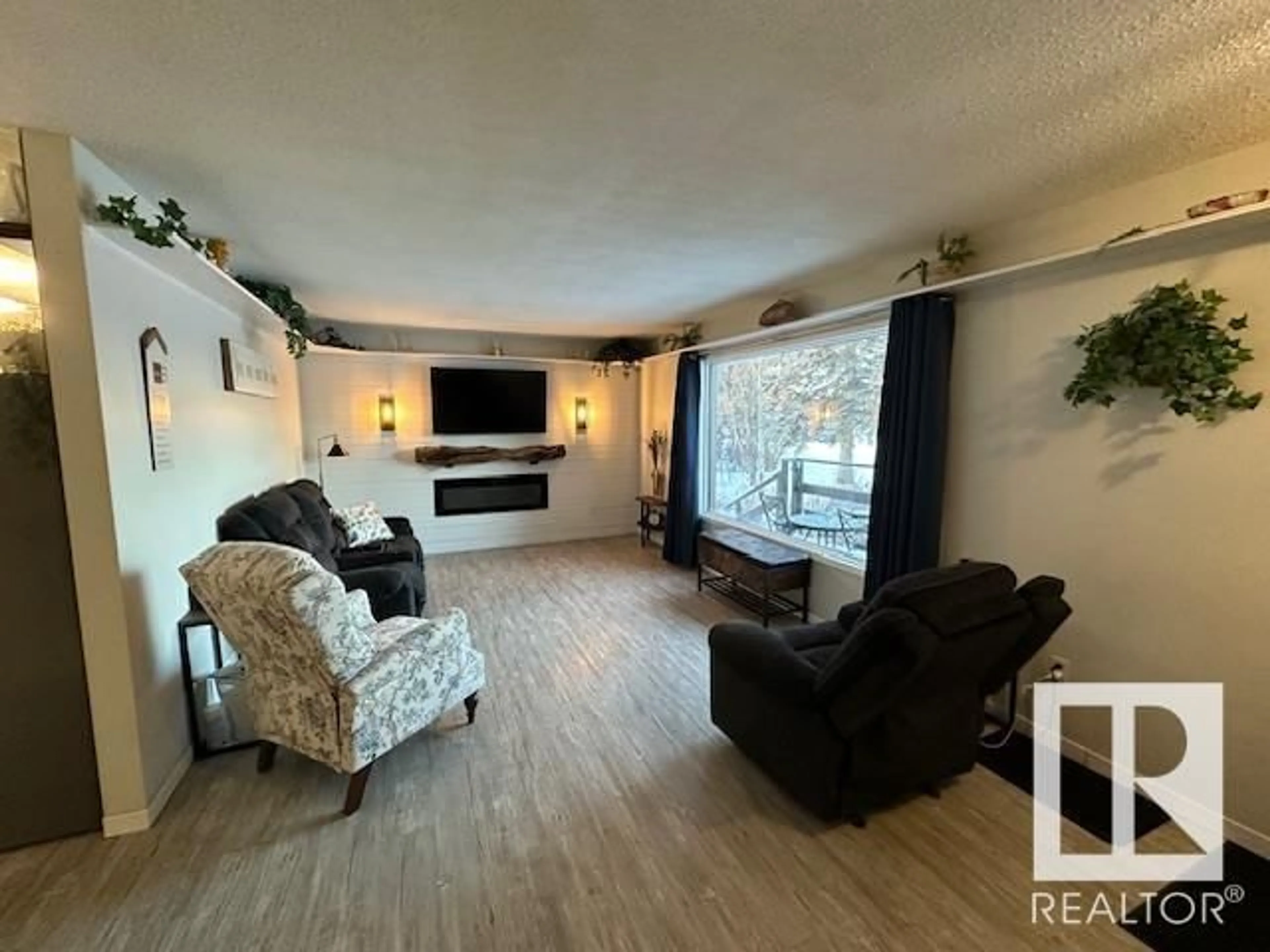 Living room with furniture, unknown for 4828 50A St, Rural Lac Ste. Anne County Alberta T0E0A0