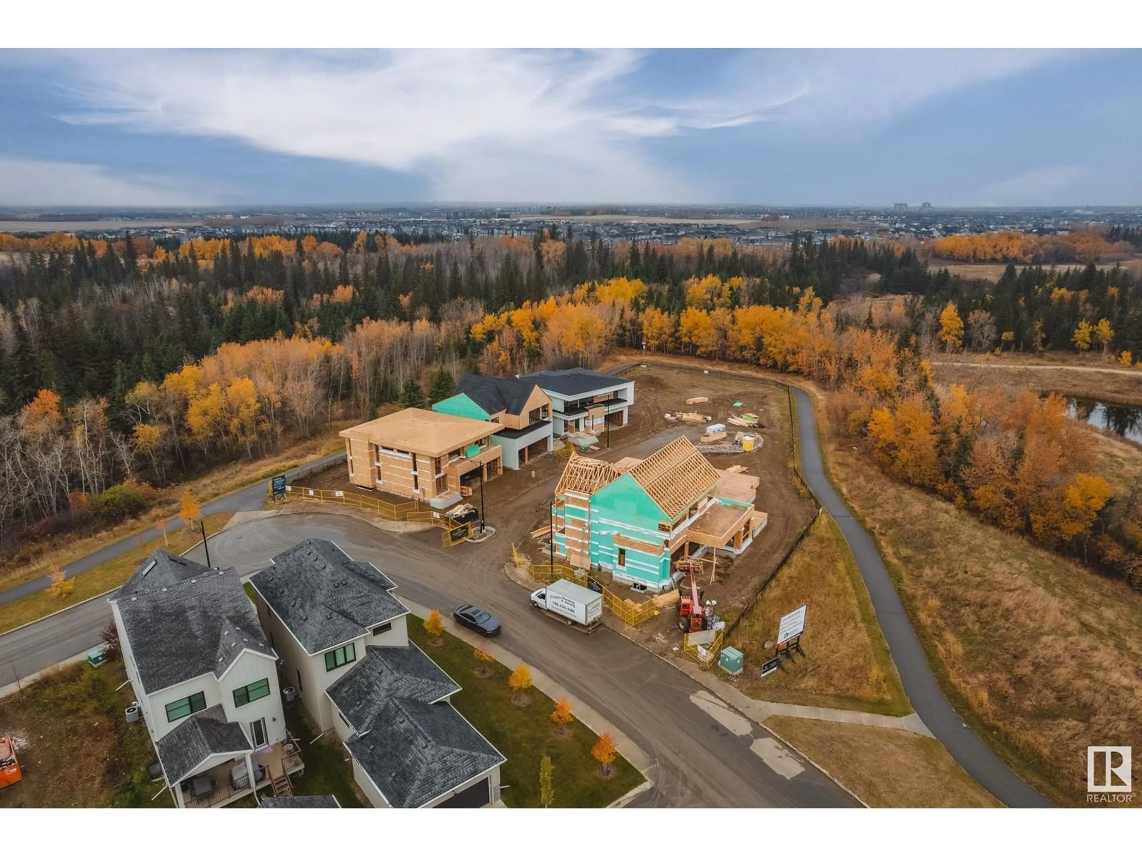 A pic from outside/outdoor area/front of a property/back of a property/a pic from drone, mountain view for #5 6090 Crawford DR SW, Edmonton Alberta T6W1A6