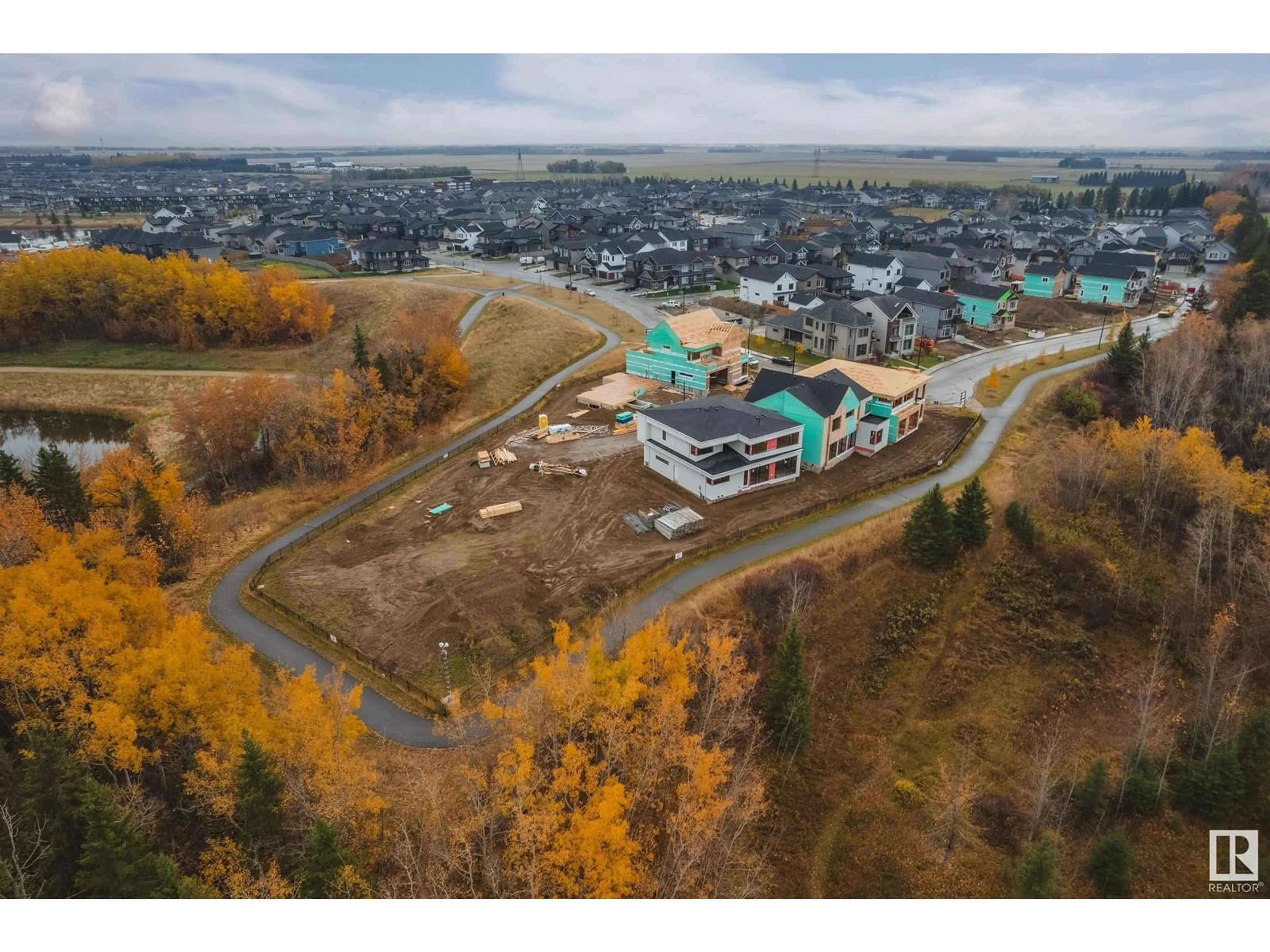 A pic from outside/outdoor area/front of a property/back of a property/a pic from drone, mountain view for #6 6090 Crawford DR SW, Edmonton Alberta T6W1A6