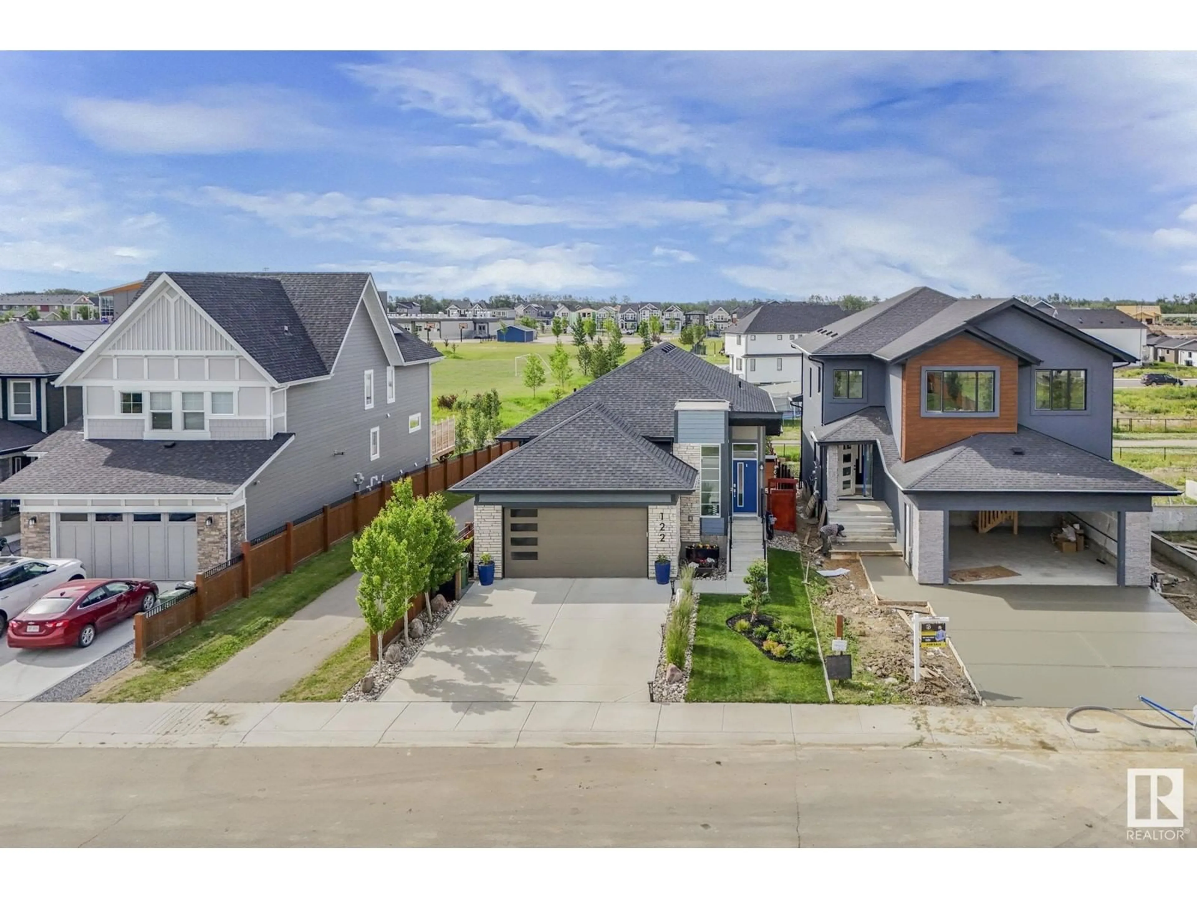 A pic from outside/outdoor area/front of a property/back of a property/a pic from drone, street for 122 EDGEWATER CI, Leduc Alberta T9E1K5