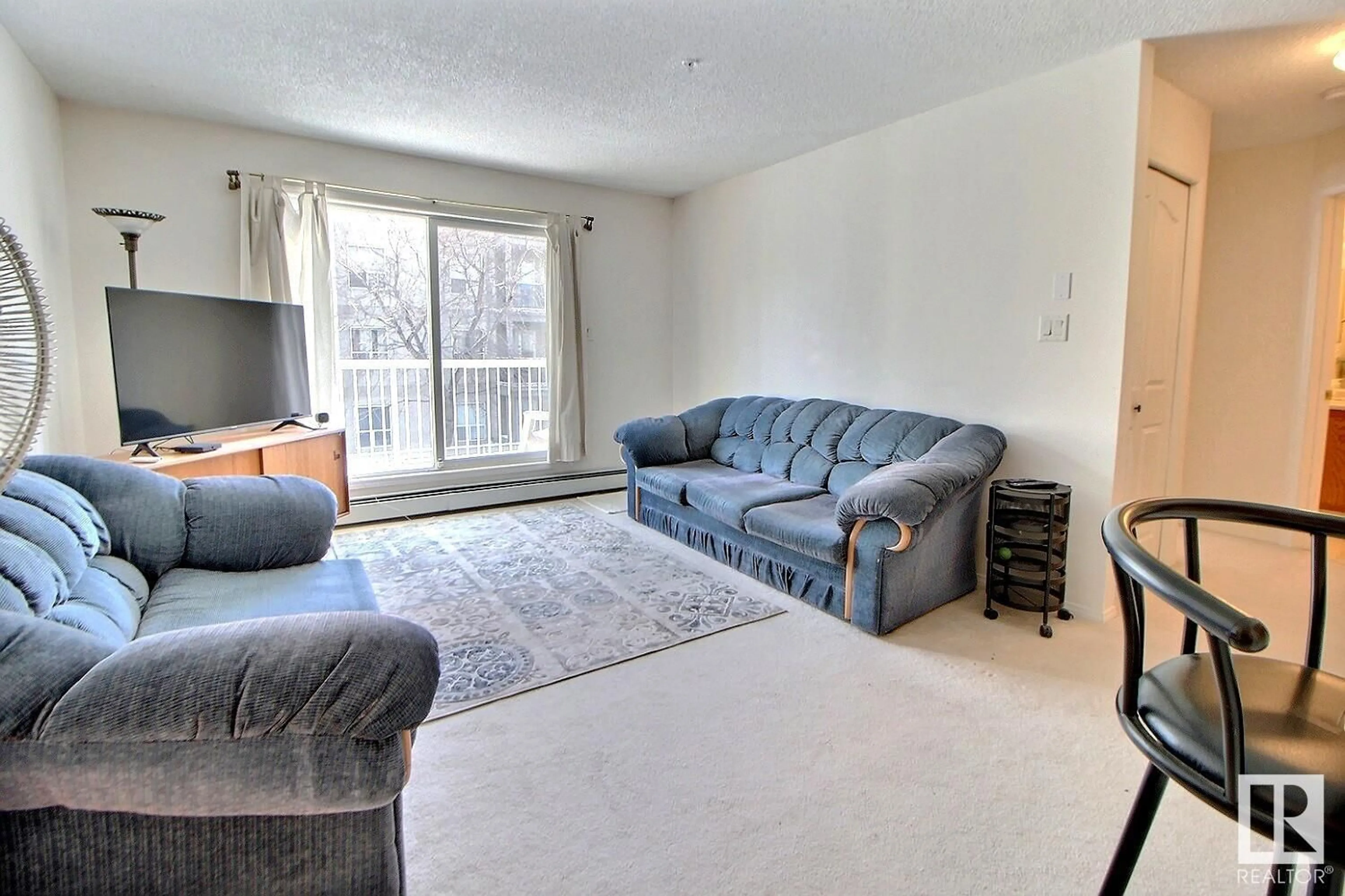 Living room with furniture, unknown for #240 17447 98A AV NW, Edmonton Alberta T5T6M4