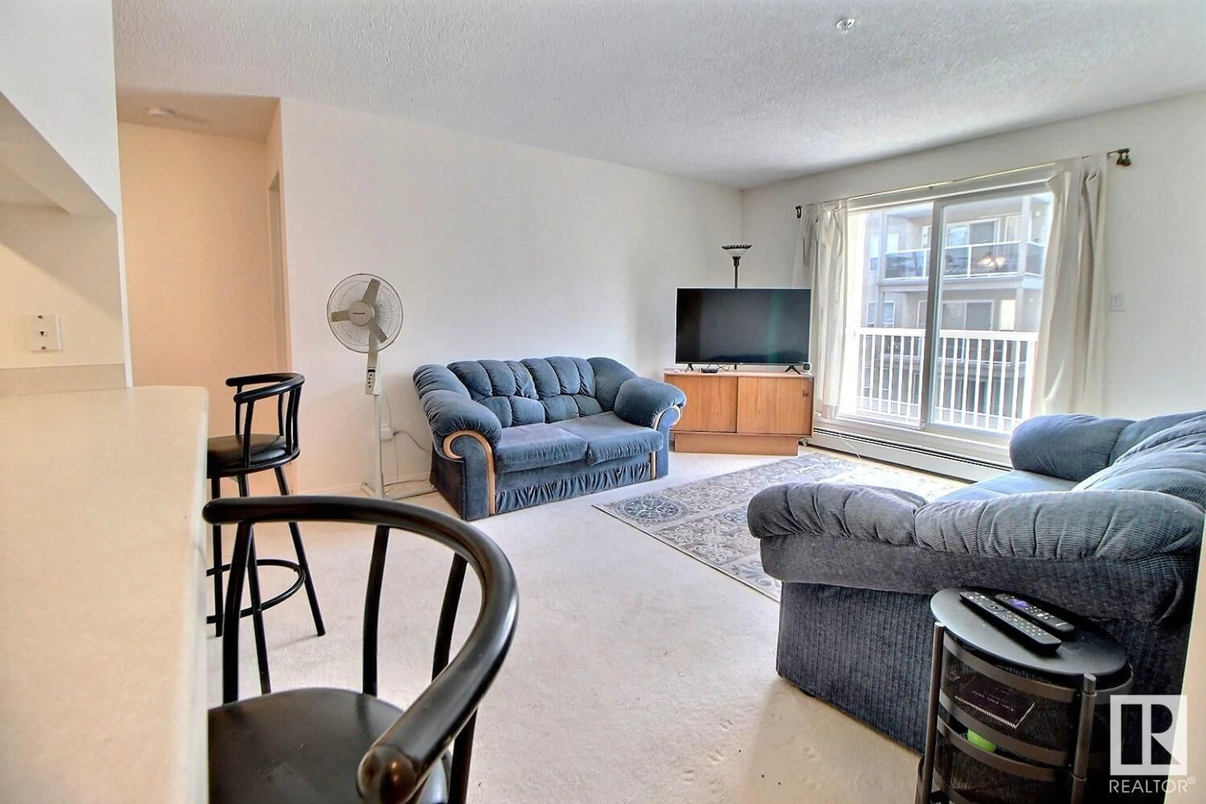 Living room with furniture, unknown for #240 17447 98A AV NW, Edmonton Alberta T5T6M4