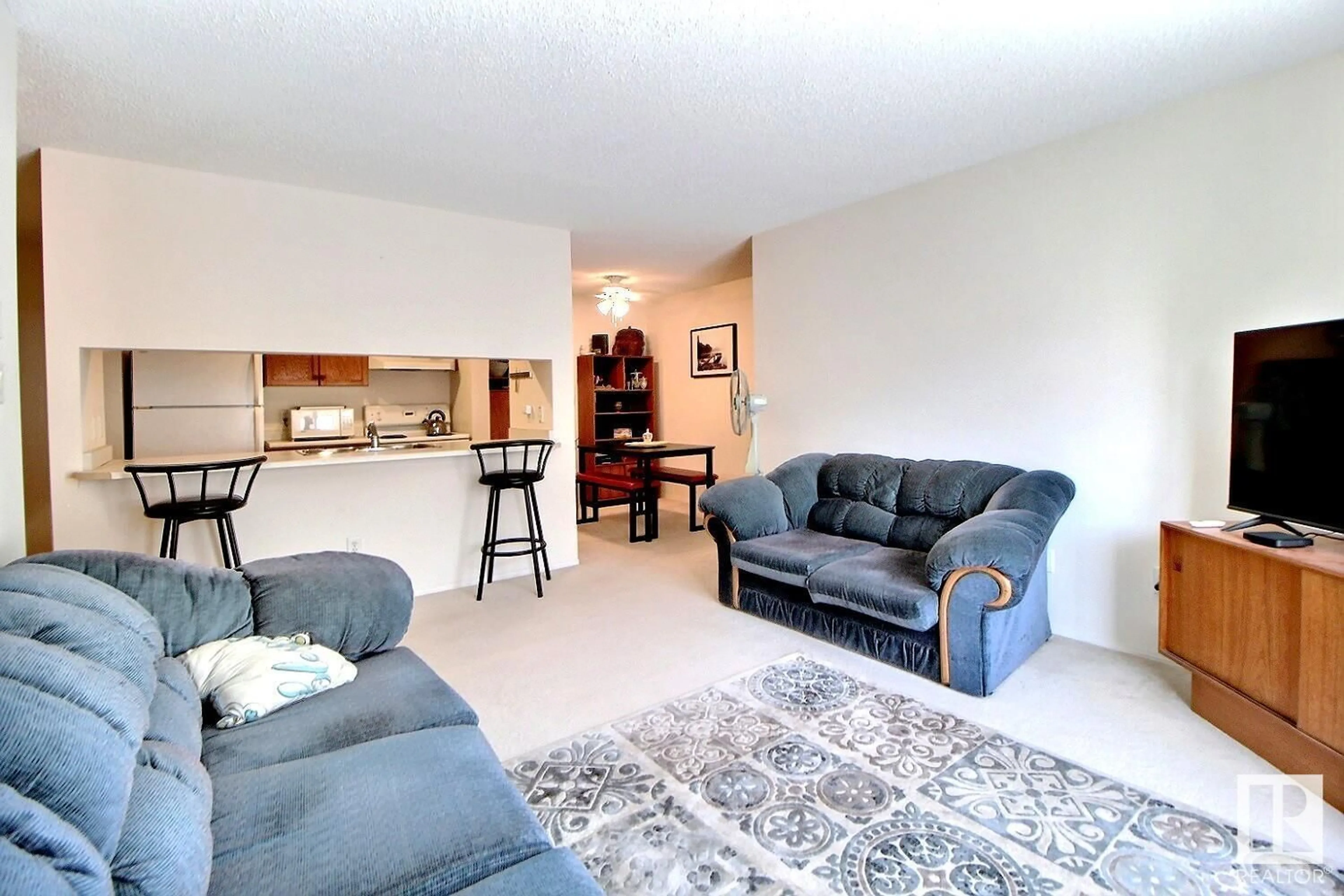 Living room with furniture, unknown for #240 17447 98A AV NW, Edmonton Alberta T5T6M4