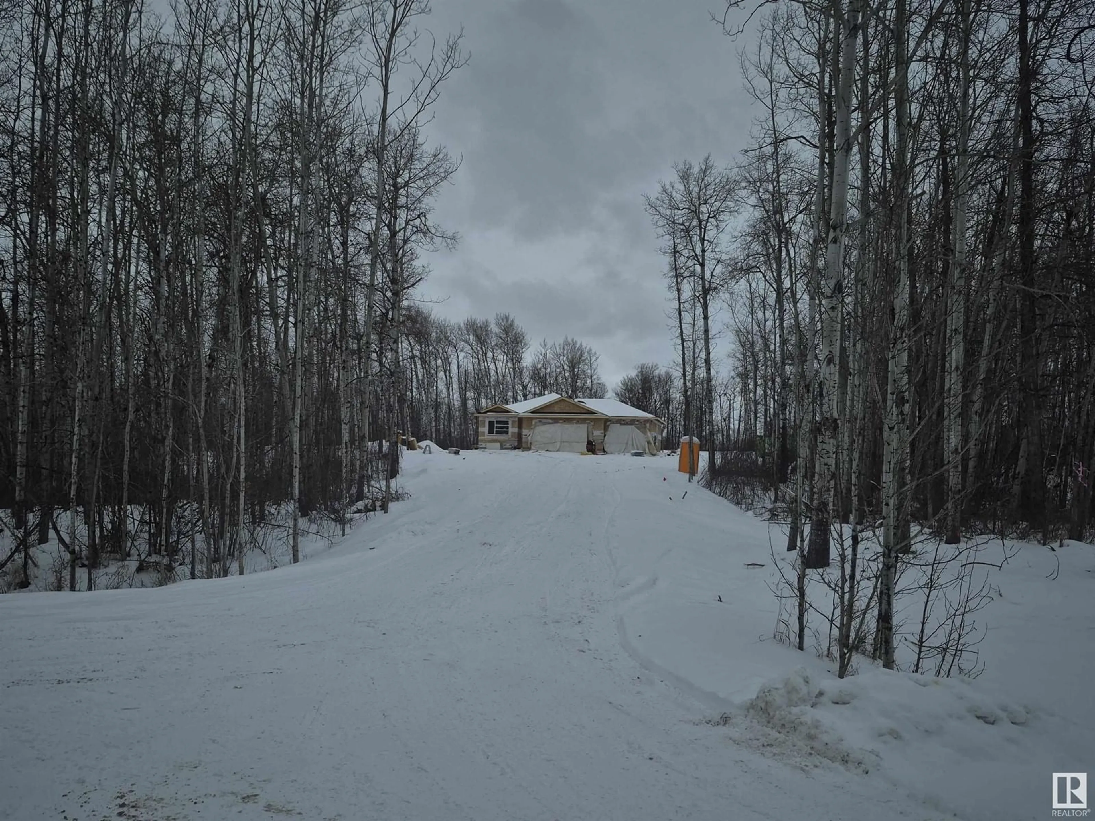 A pic from outside/outdoor area/front of a property/back of a property/a pic from drone, forest/trees view for #33 54422 RGE ROAD 13, Rural Lac Ste. Anne County Alberta T0E1V2