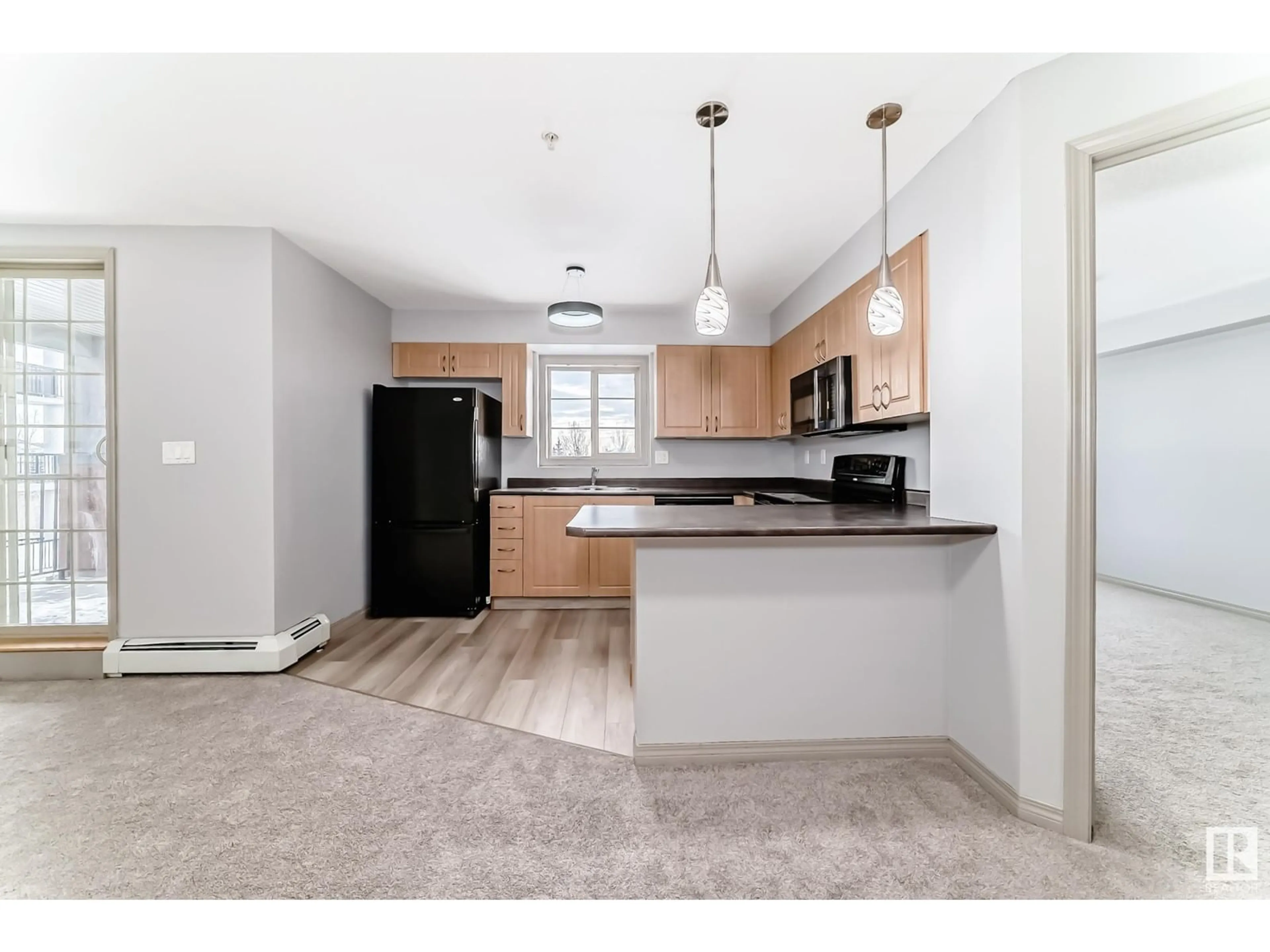 Open concept kitchen, unknown for #301 11453 ELLERSLIE RD SW, Edmonton Alberta T6W1T3