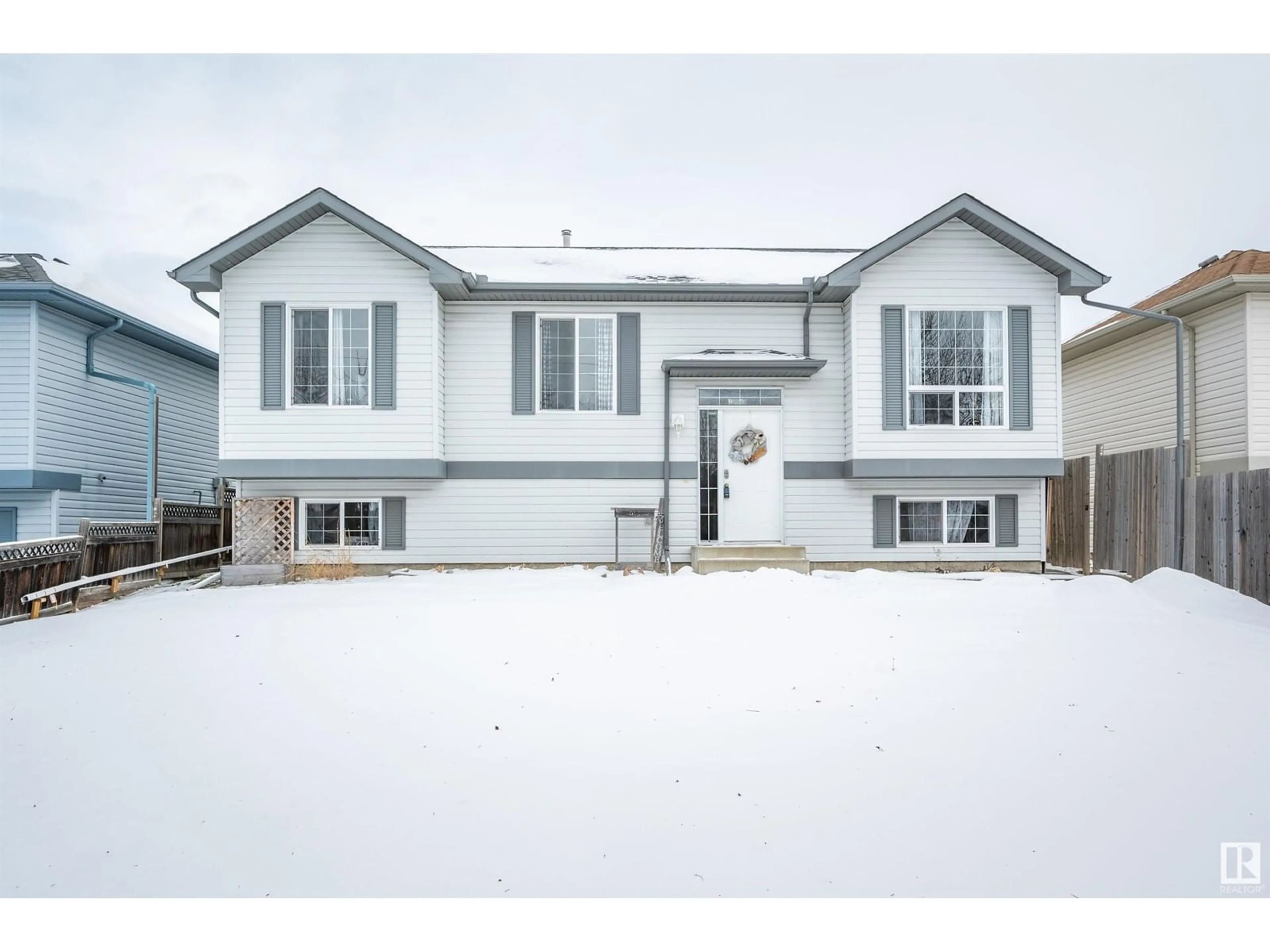 Home with vinyl exterior material, street for 23 SPRUCE MEADOW LN, Bon Accord Alberta T0A0K0