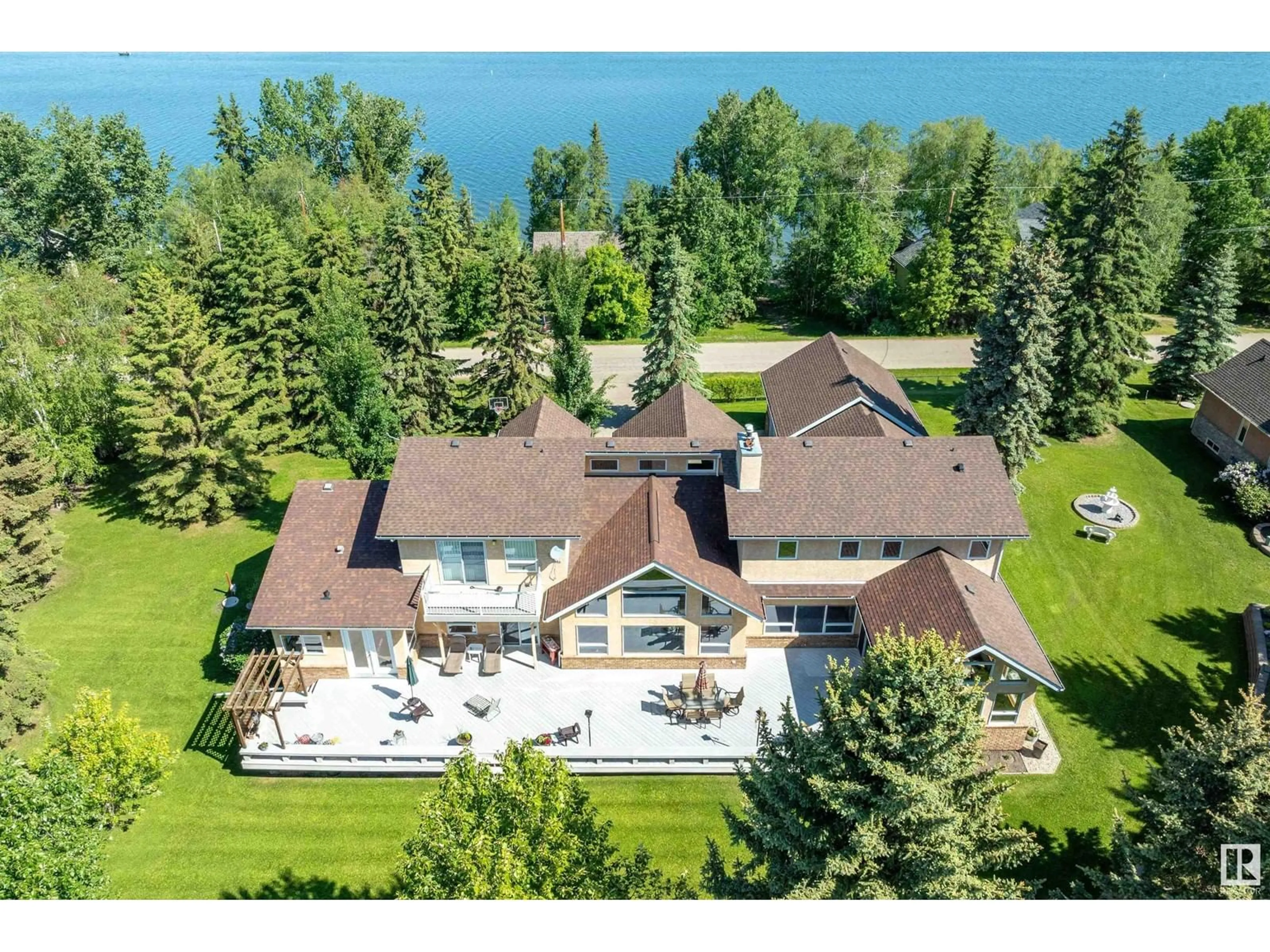 A pic from outside/outdoor area/front of a property/back of a property/a pic from drone, water/lake/river/ocean view for 248 Lakeshore Dr, Rural Wetaskiwin County Alberta T0C2V0