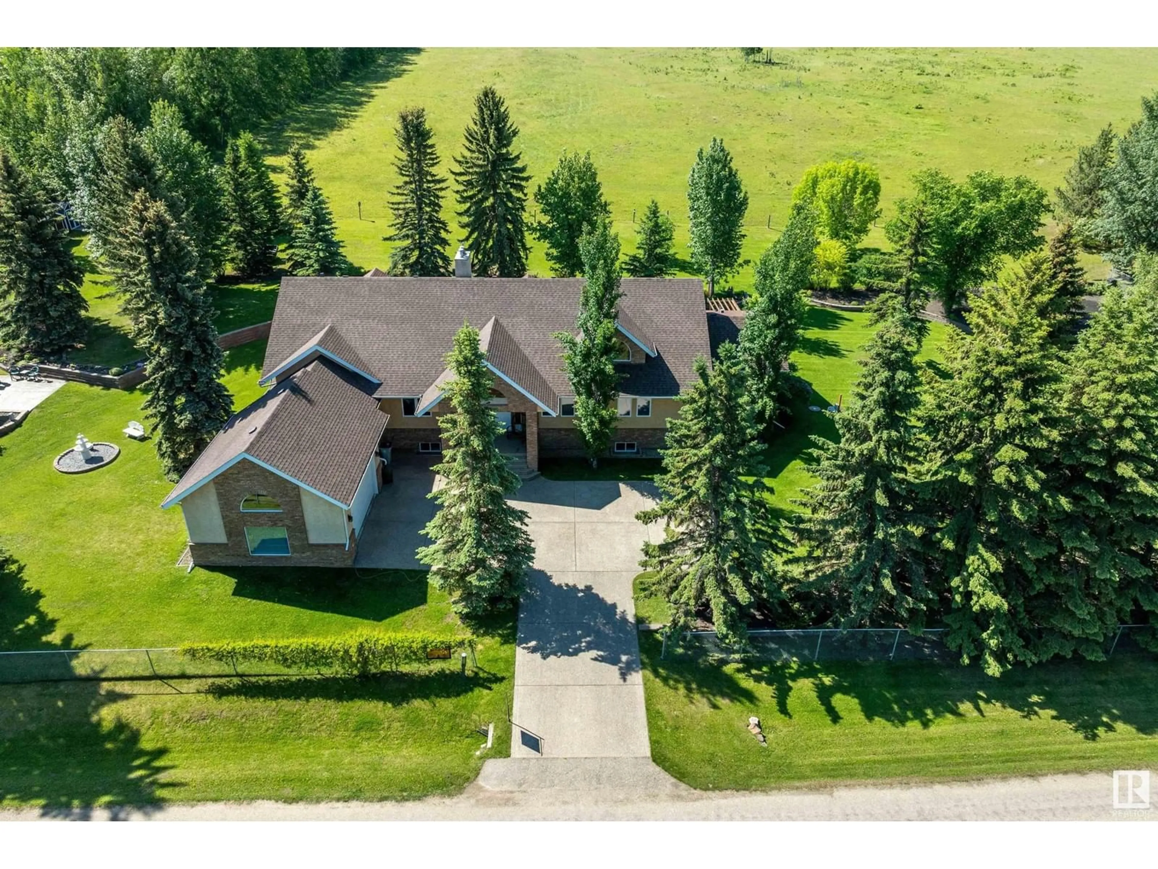 A pic from outside/outdoor area/front of a property/back of a property/a pic from drone, unknown for 248 Lakeshore Dr, Rural Wetaskiwin County Alberta T0C2V0