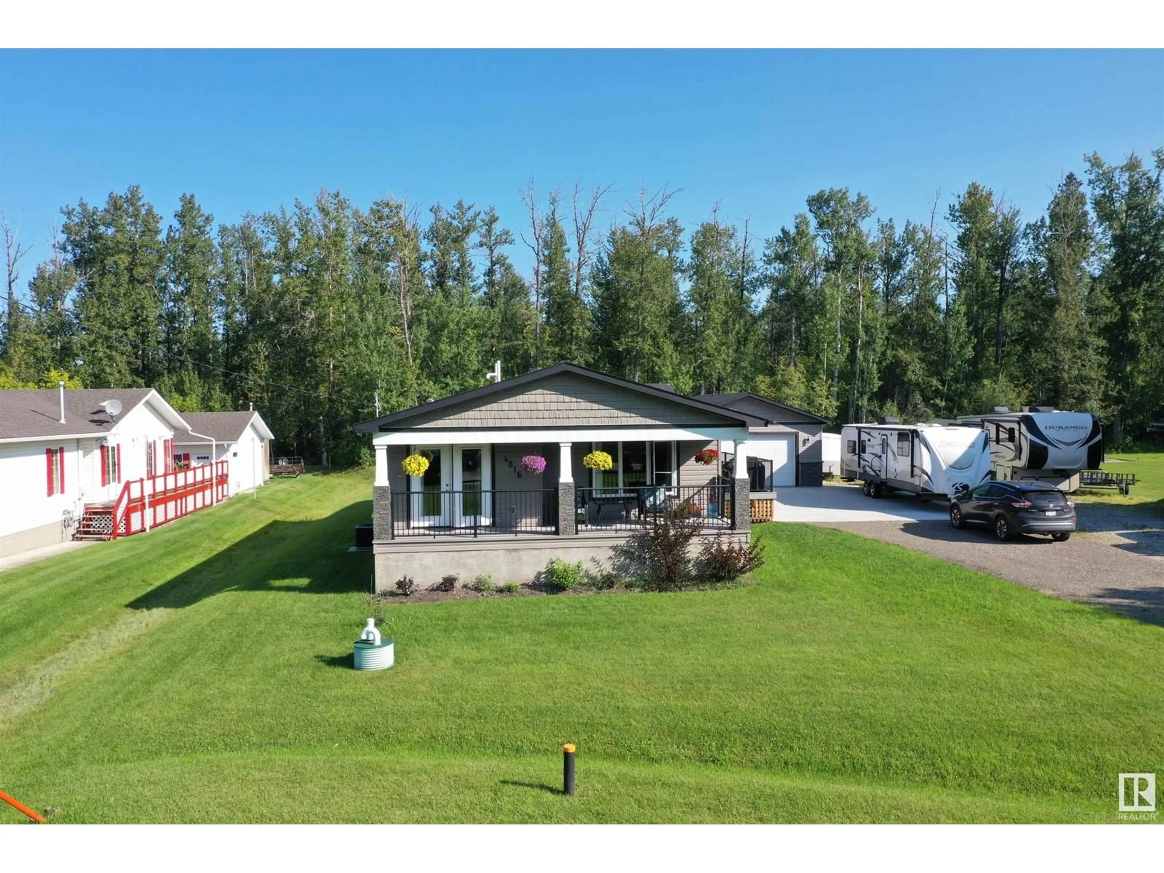 A pic from outside/outdoor area/front of a property/back of a property/a pic from drone, unknown for 4816 49A AV, Rural Lac Ste. Anne County Alberta T0E0A0