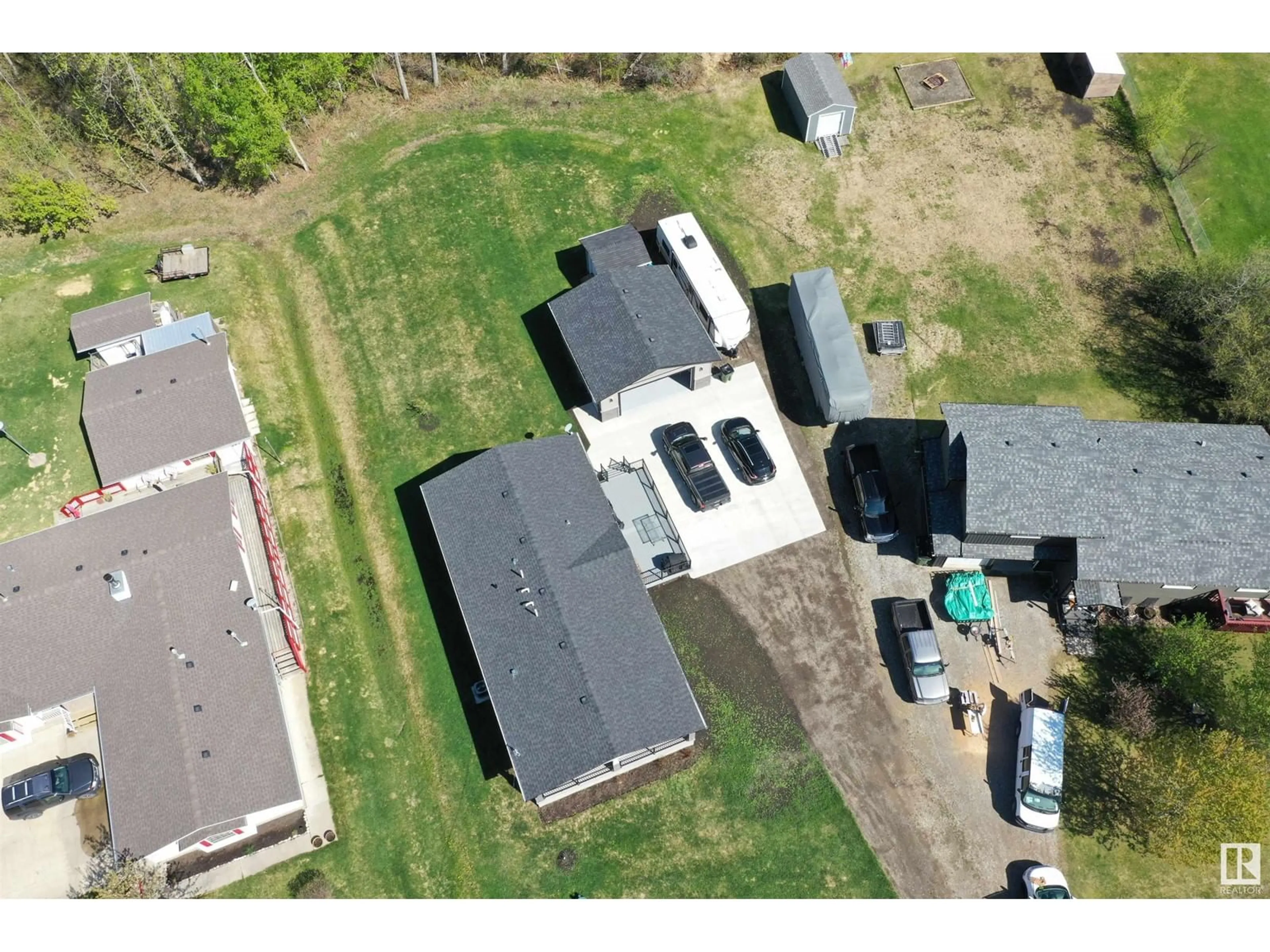 A pic from outside/outdoor area/front of a property/back of a property/a pic from drone, building for 4816 49A AV, Rural Lac Ste. Anne County Alberta T0E0A0