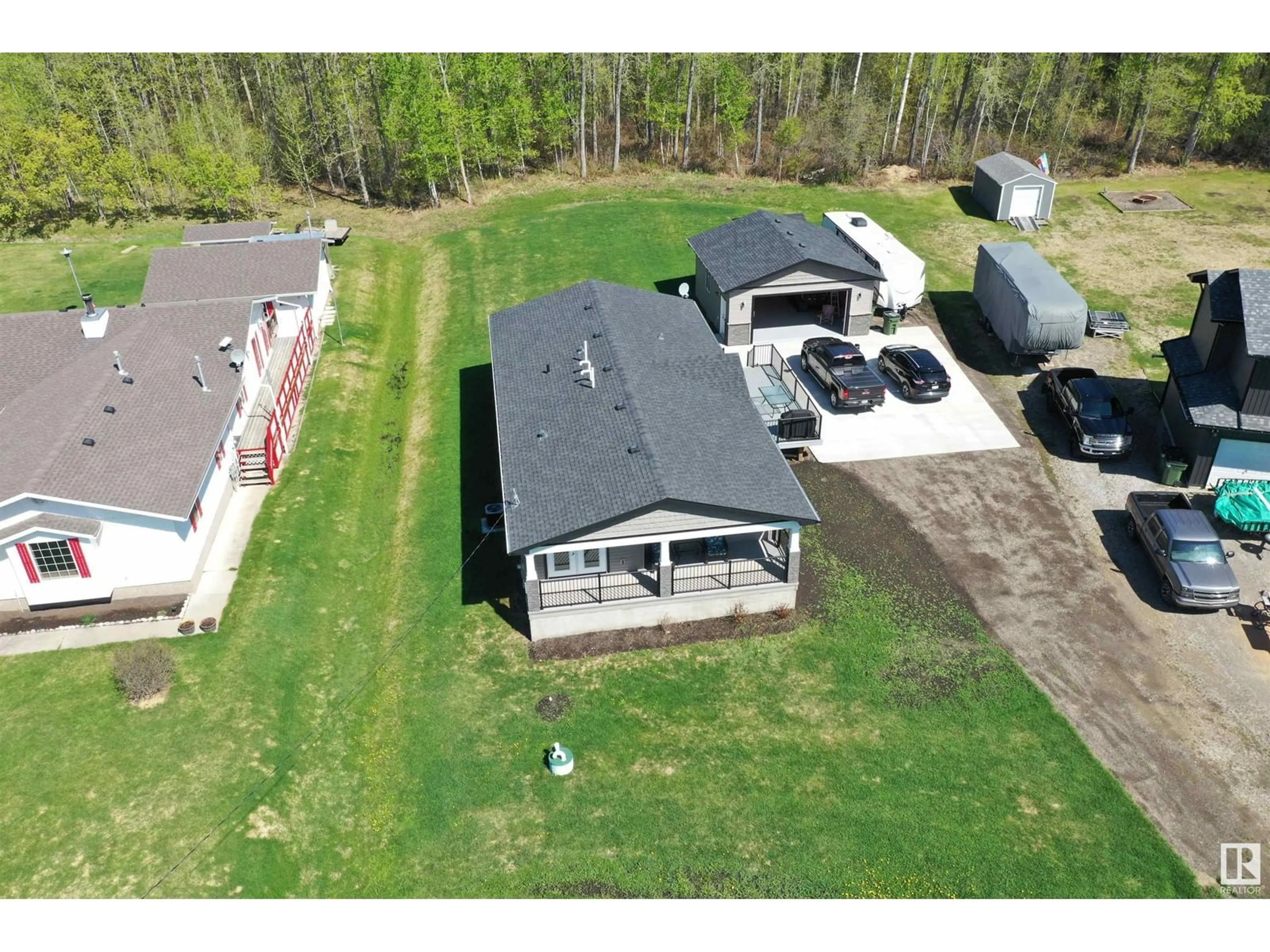 A pic from outside/outdoor area/front of a property/back of a property/a pic from drone, building for 4816 49A AV, Rural Lac Ste. Anne County Alberta T0E0A0