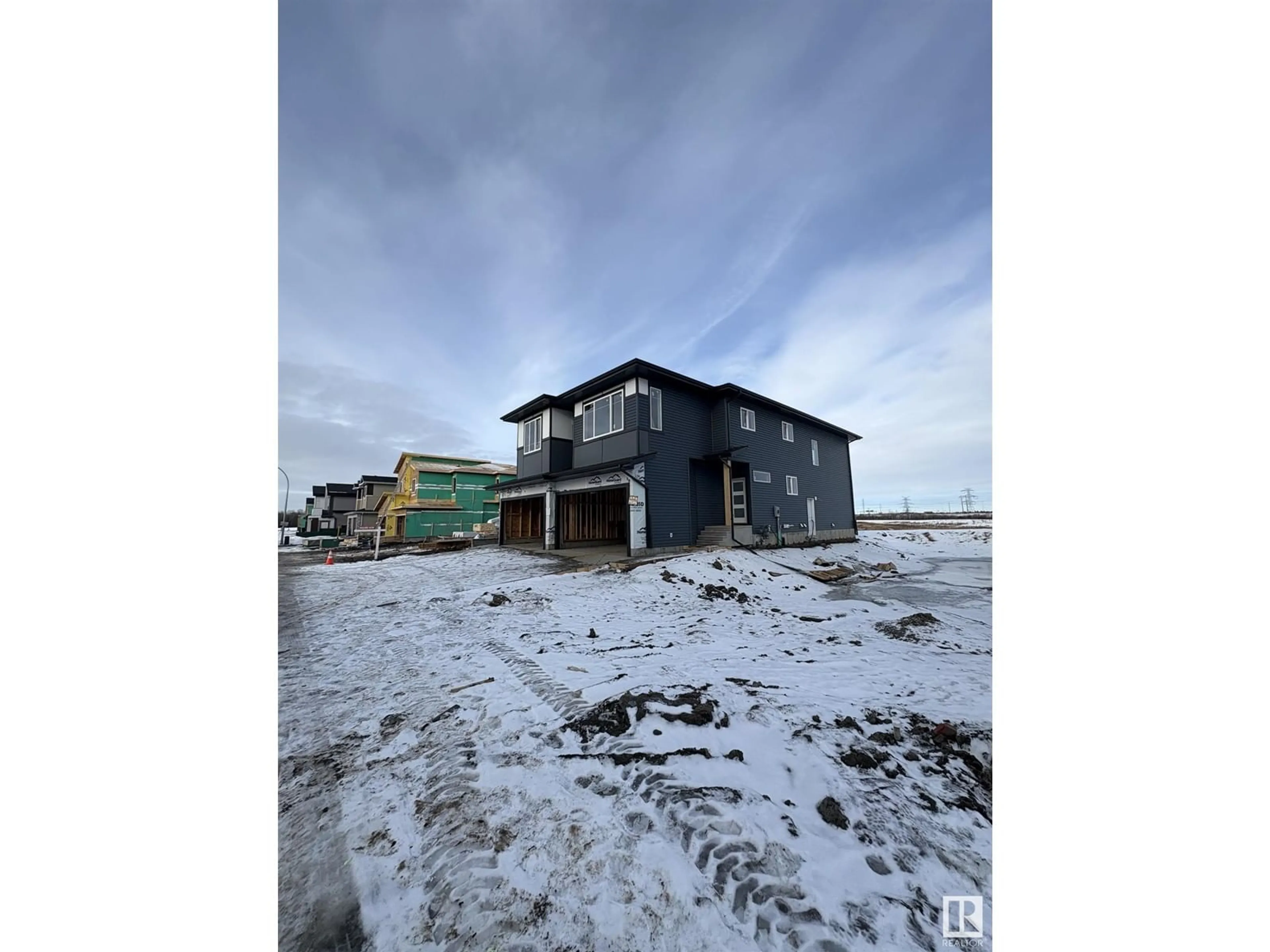 A pic from outside/outdoor area/front of a property/back of a property/a pic from drone, building for 1904 155 AV NW, Edmonton Alberta T5Y4H8