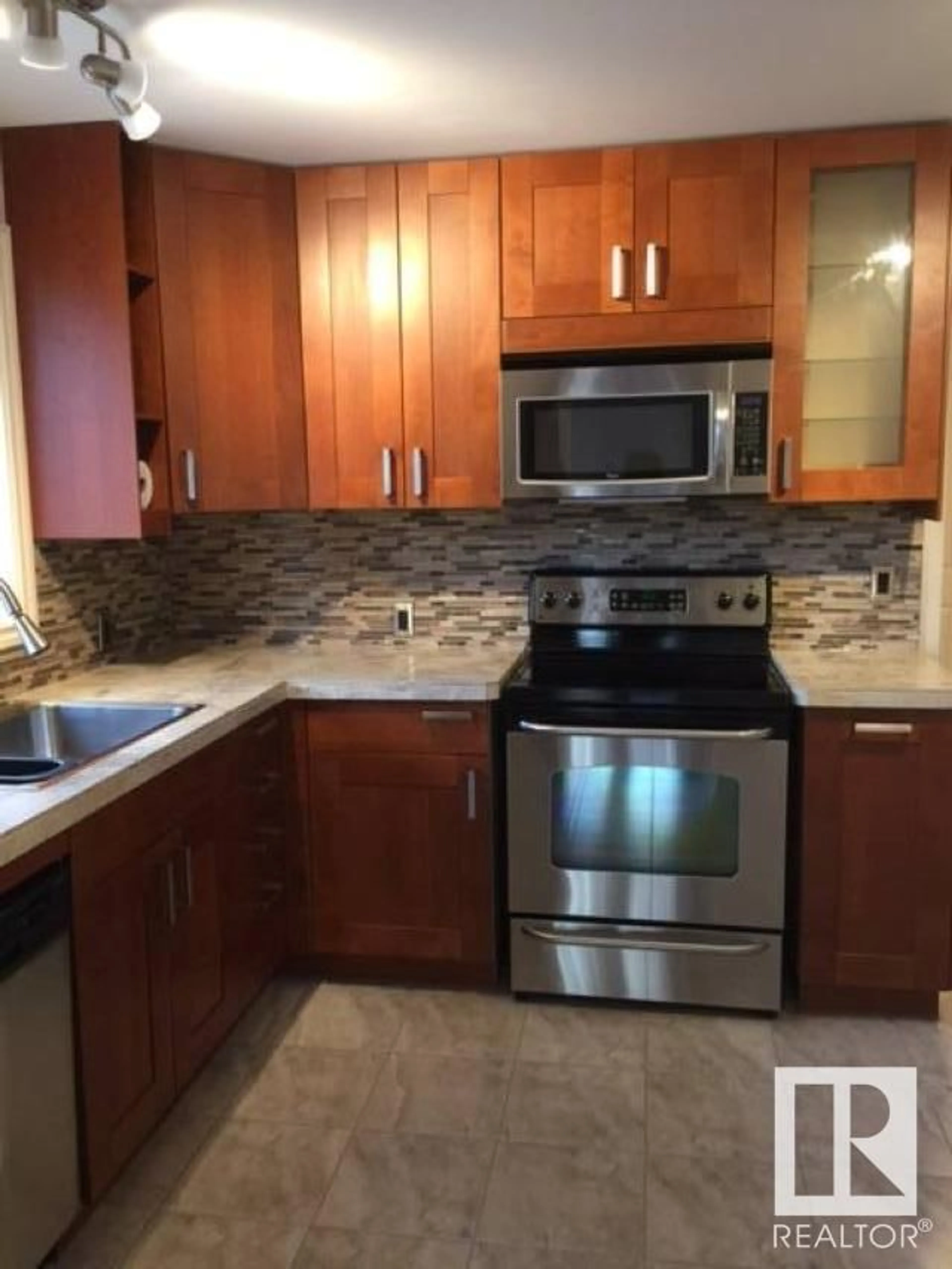 Standard kitchen, ceramic/tile floor for 16705 90 AV NW, Edmonton Alberta T5R4W9