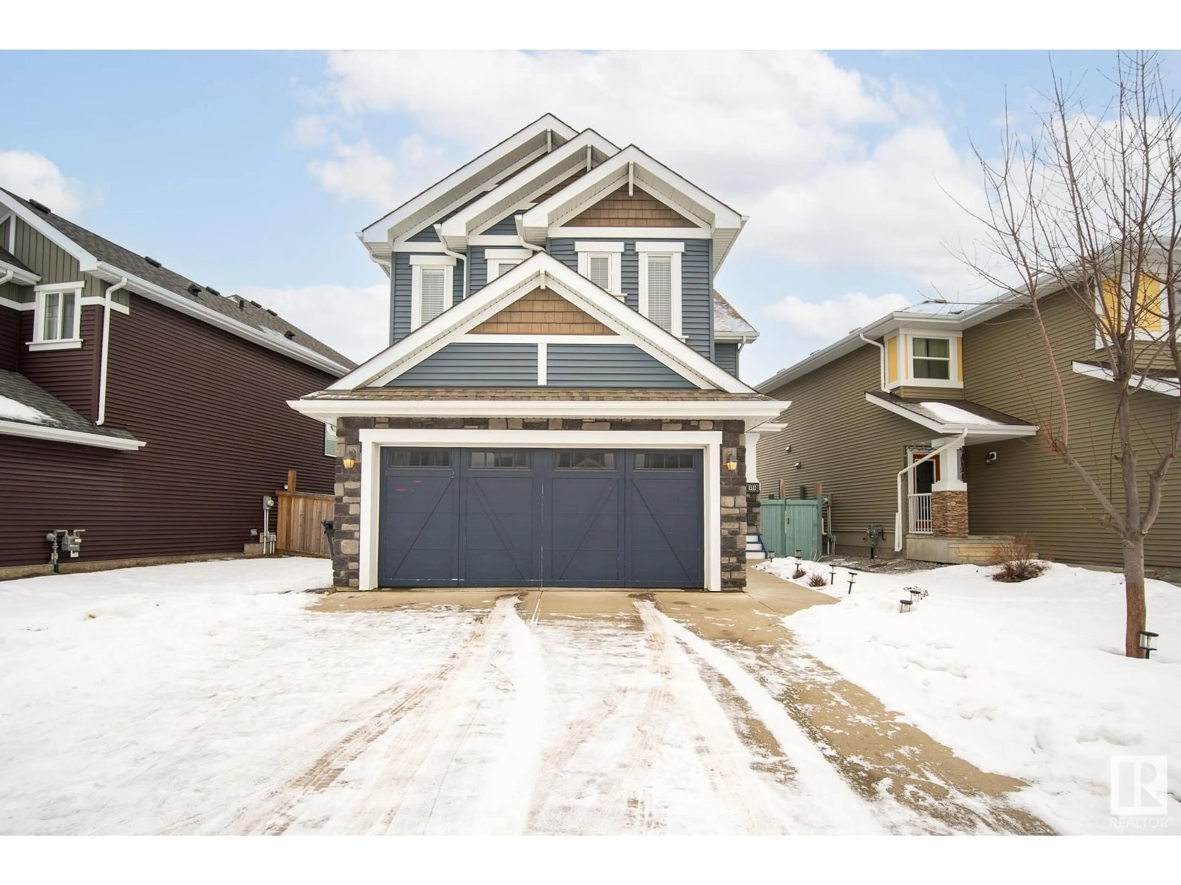 Home with brick exterior material, street for 1511 165 ST SW, Edmonton Alberta T6W2Z7