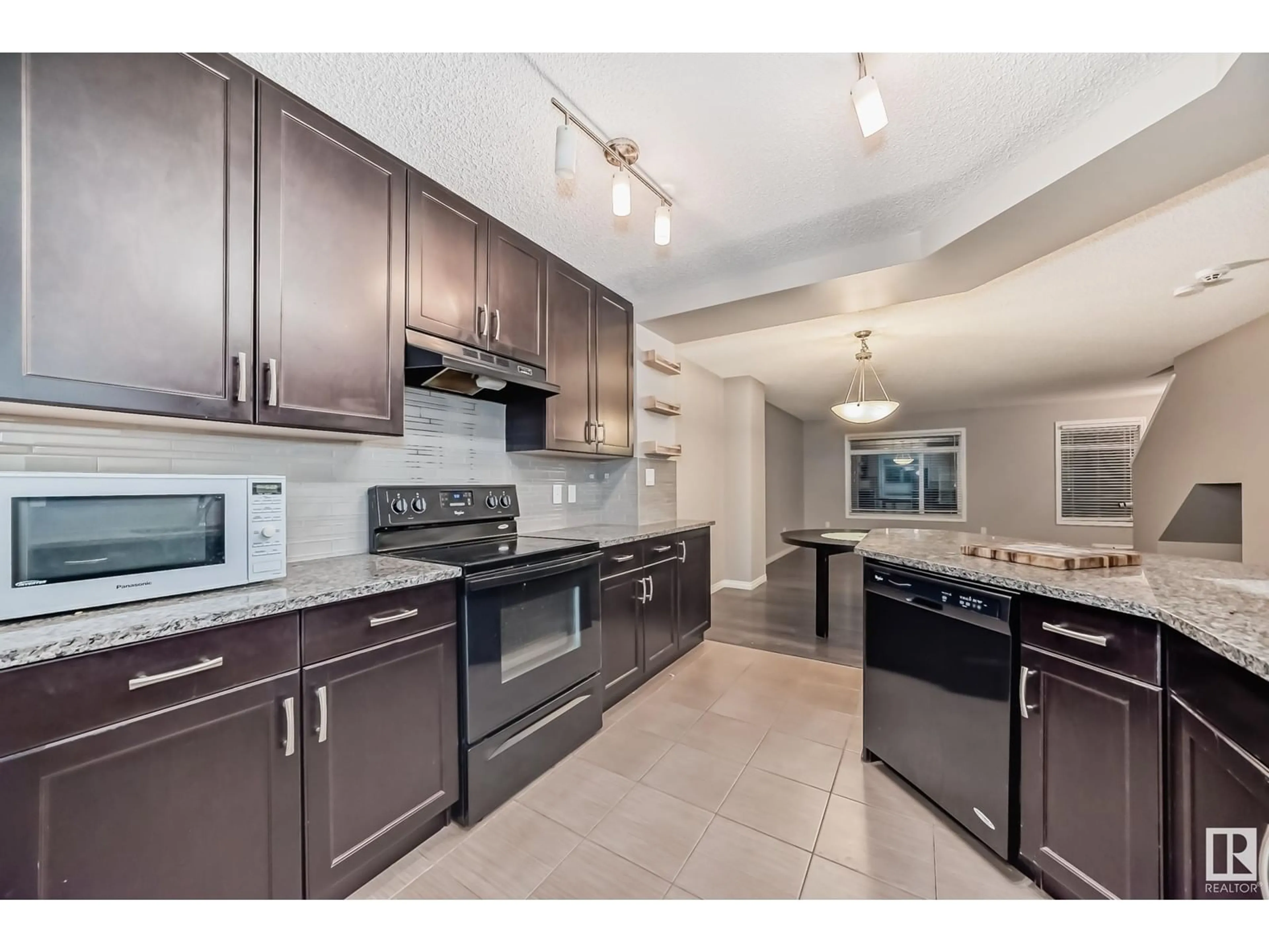 Open concept kitchen, ceramic/tile floor for #65 7503 GETTY GATE GA NW, Edmonton Alberta T5T4S8