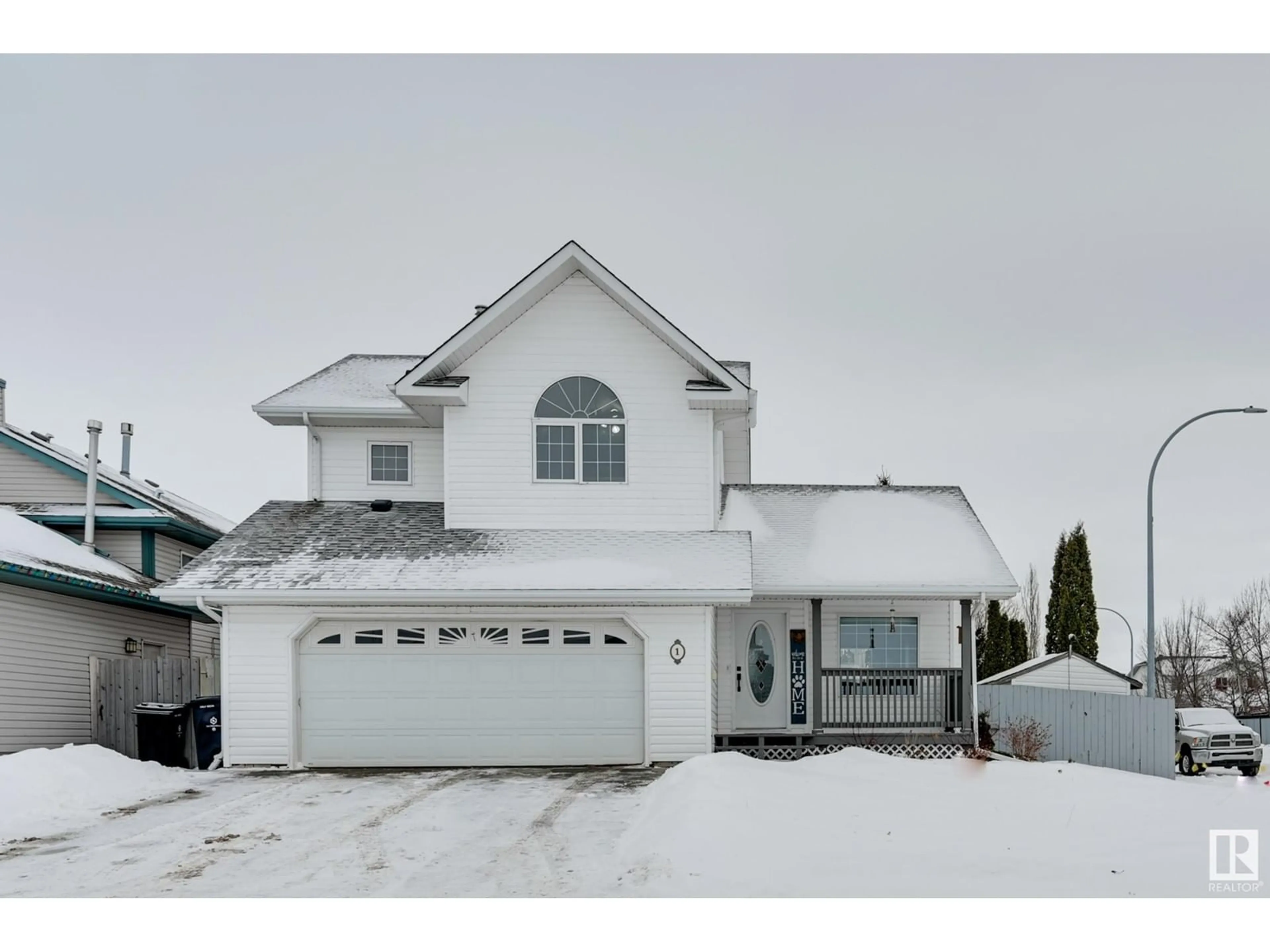 Home with vinyl exterior material, street for 1 RIVERPARK RD, Fort Saskatchewan Alberta T8L4K5