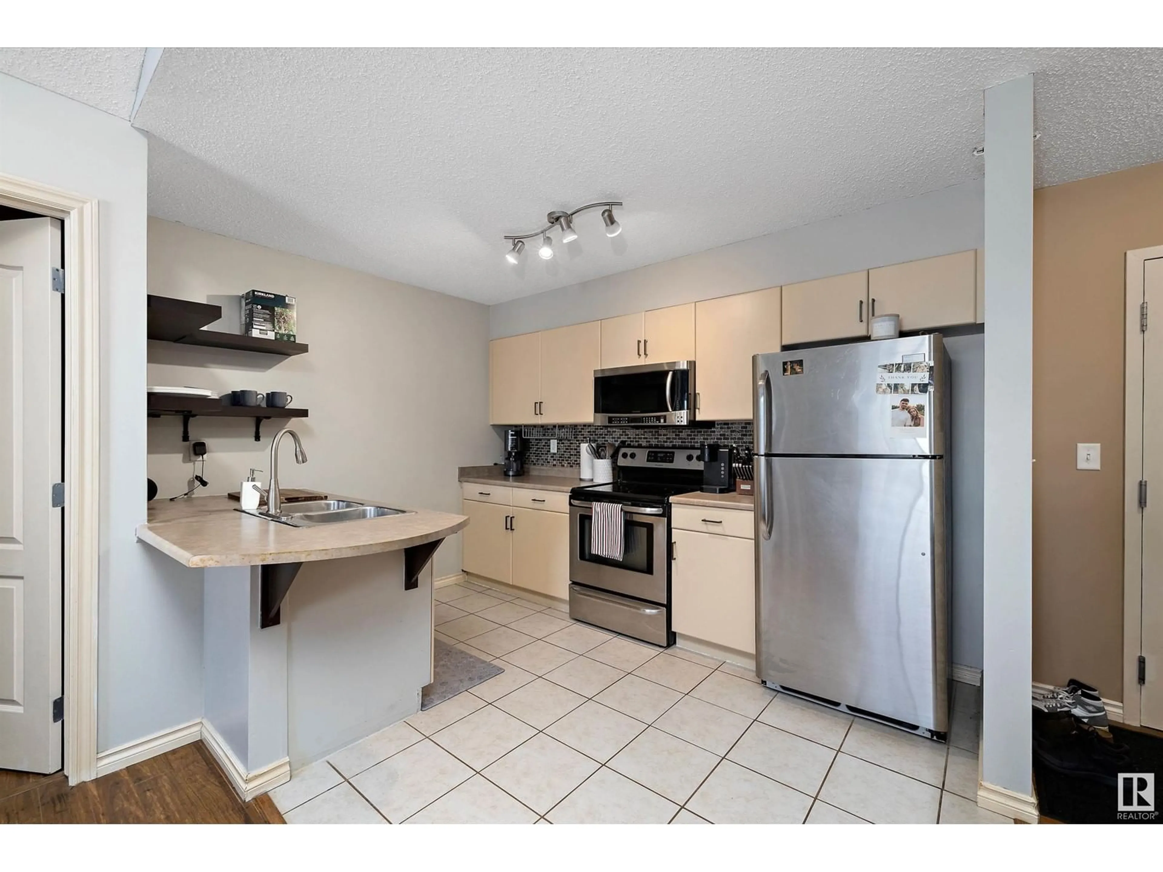 Standard kitchen, ceramic/tile floor for #309 905 BLACKLOCK WY SW, Edmonton Alberta T6W1M7