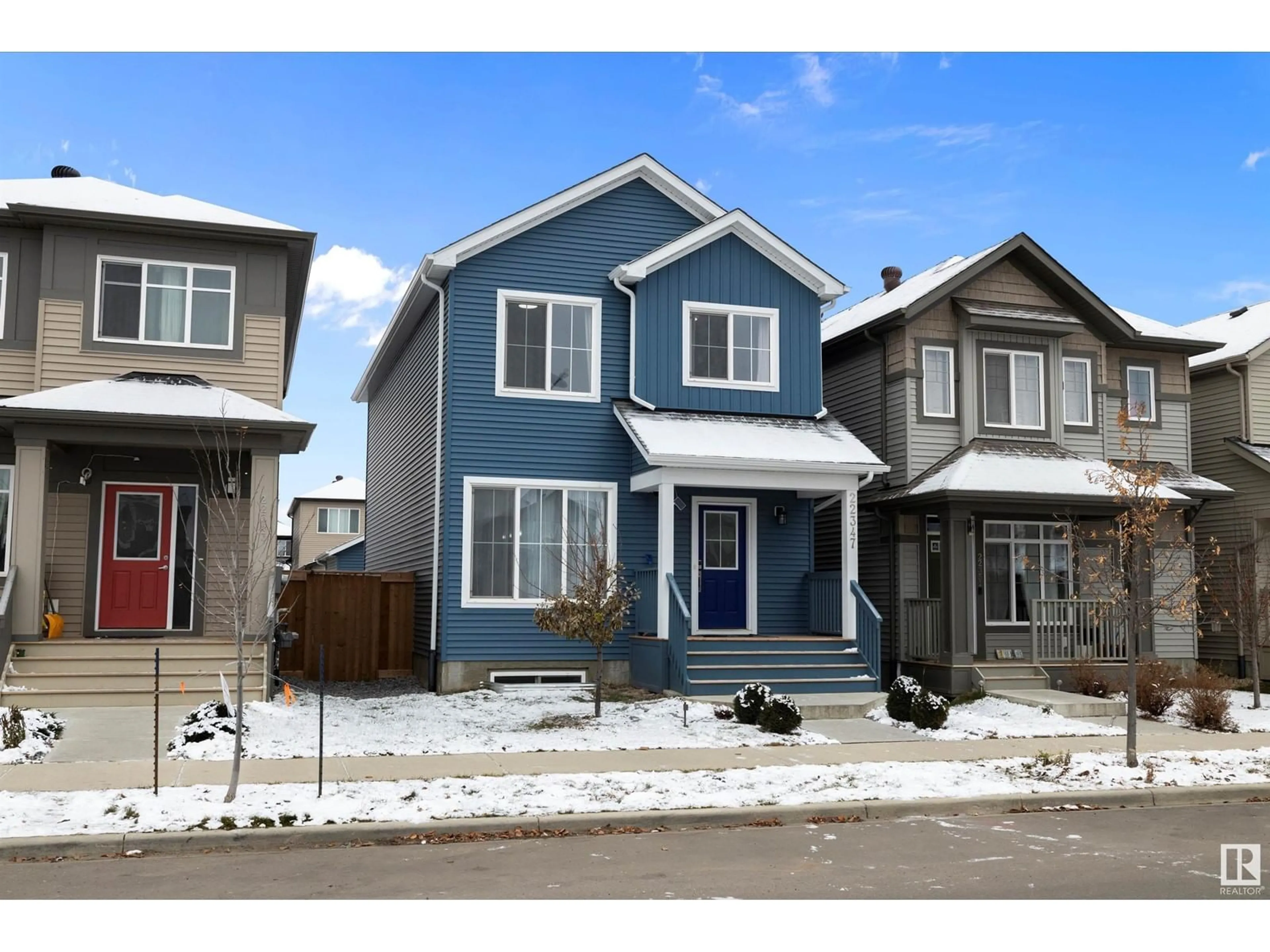 Home with vinyl exterior material, street for 22347 93 AV NW, Edmonton Alberta T5T7L9