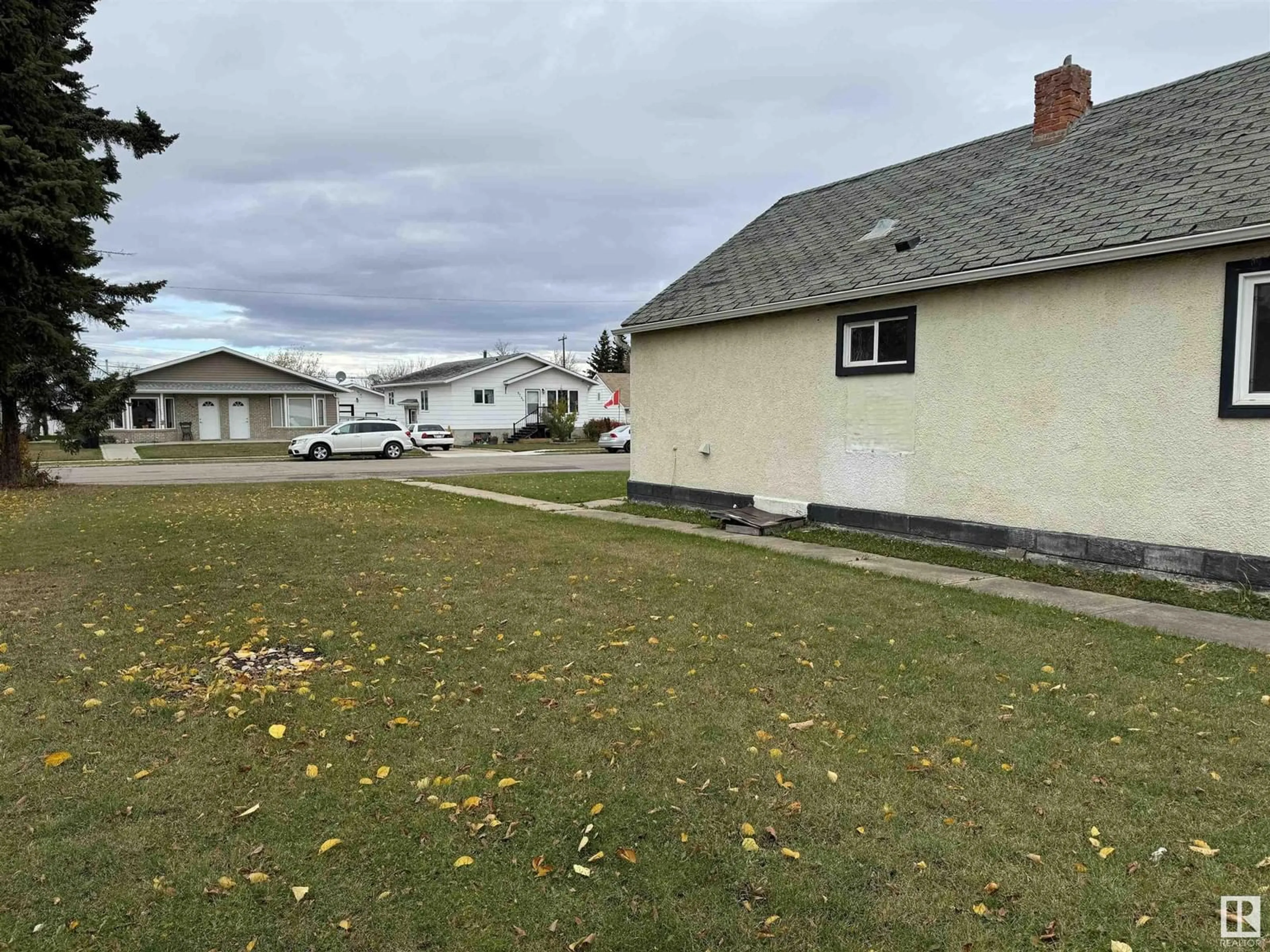 A pic from outside/outdoor area/front of a property/back of a property/a pic from drone, street for 9739 106 ST, Westlock Alberta T7P1S3