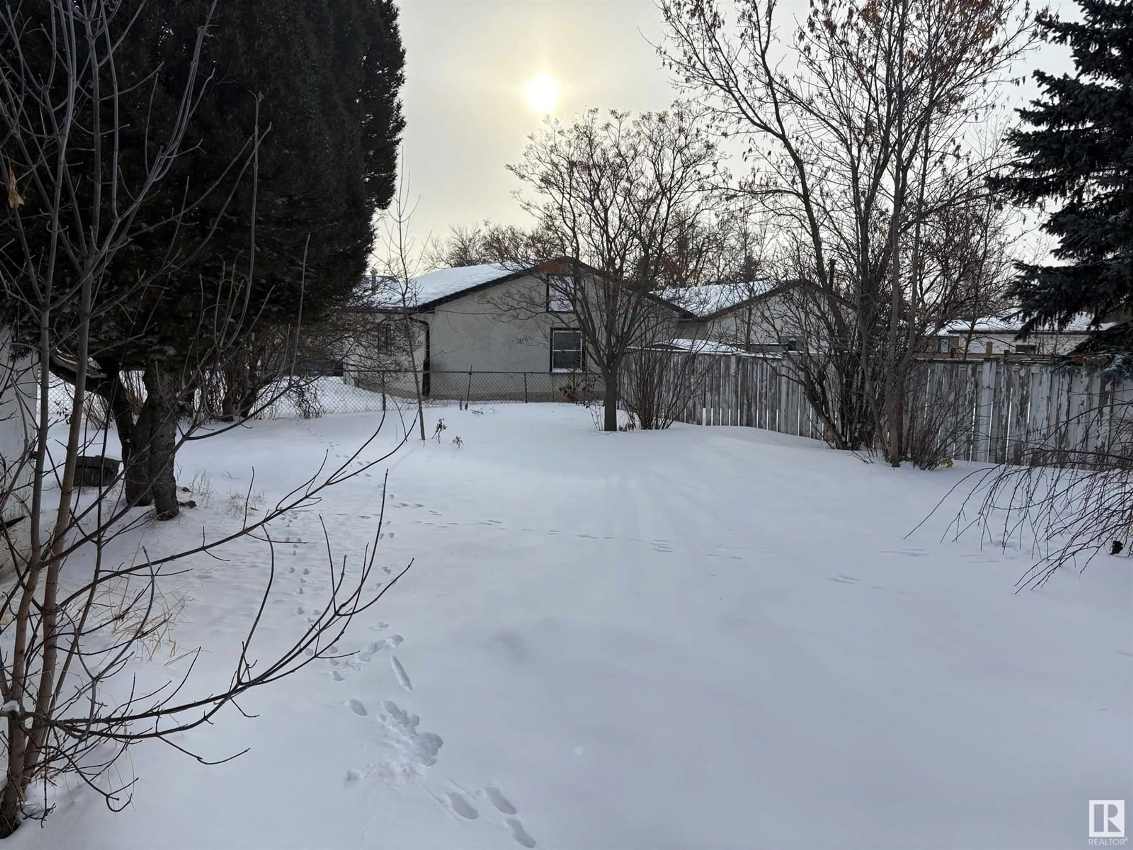 A pic from outside/outdoor area/front of a property/back of a property/a pic from drone, unknown for 6011 146 AV NW, Edmonton Alberta T5A1S9