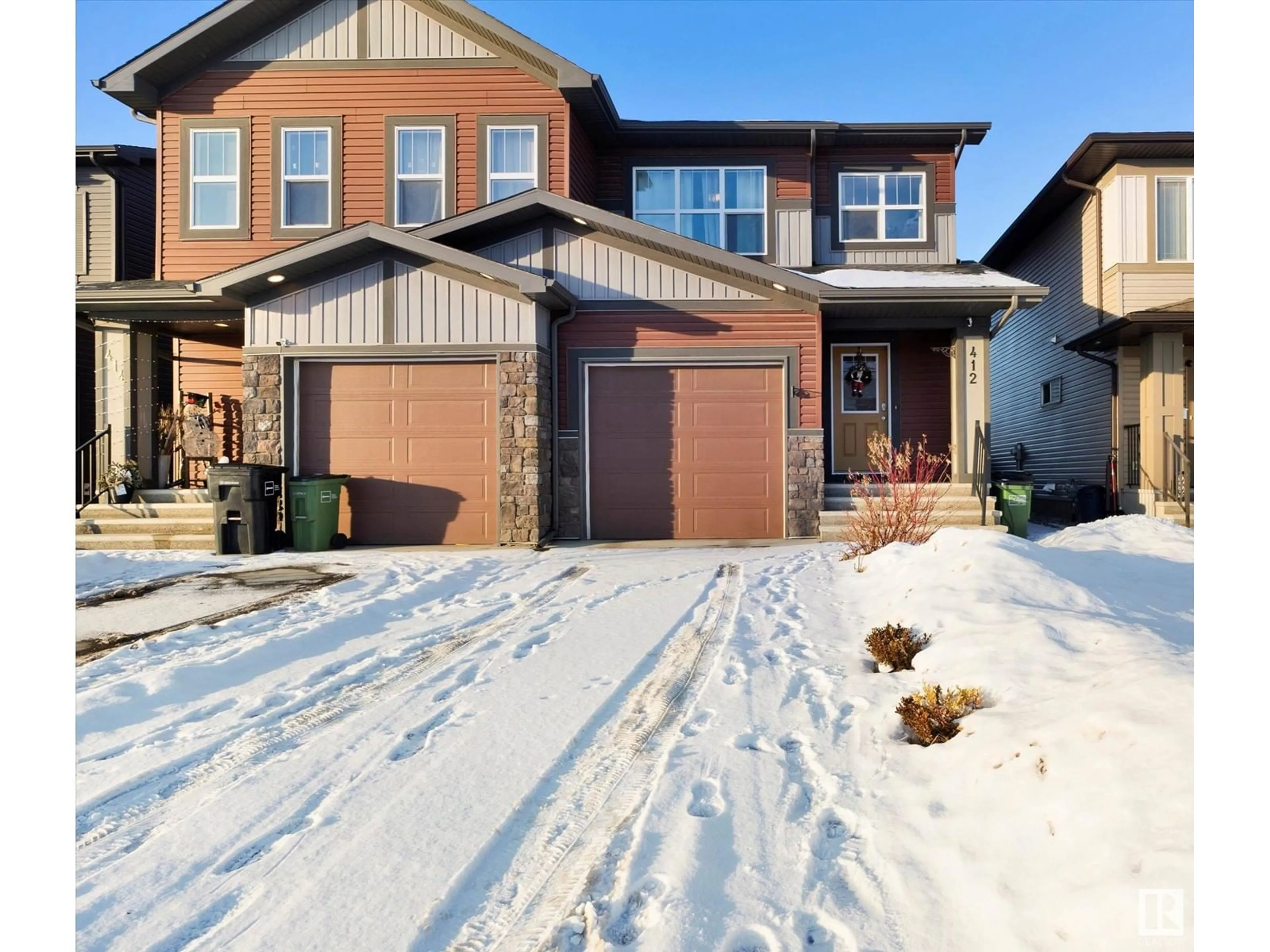 Home with brick exterior material, street for 412 CRYSTALLINA NERA DR NW, Edmonton Alberta T5Z0P3