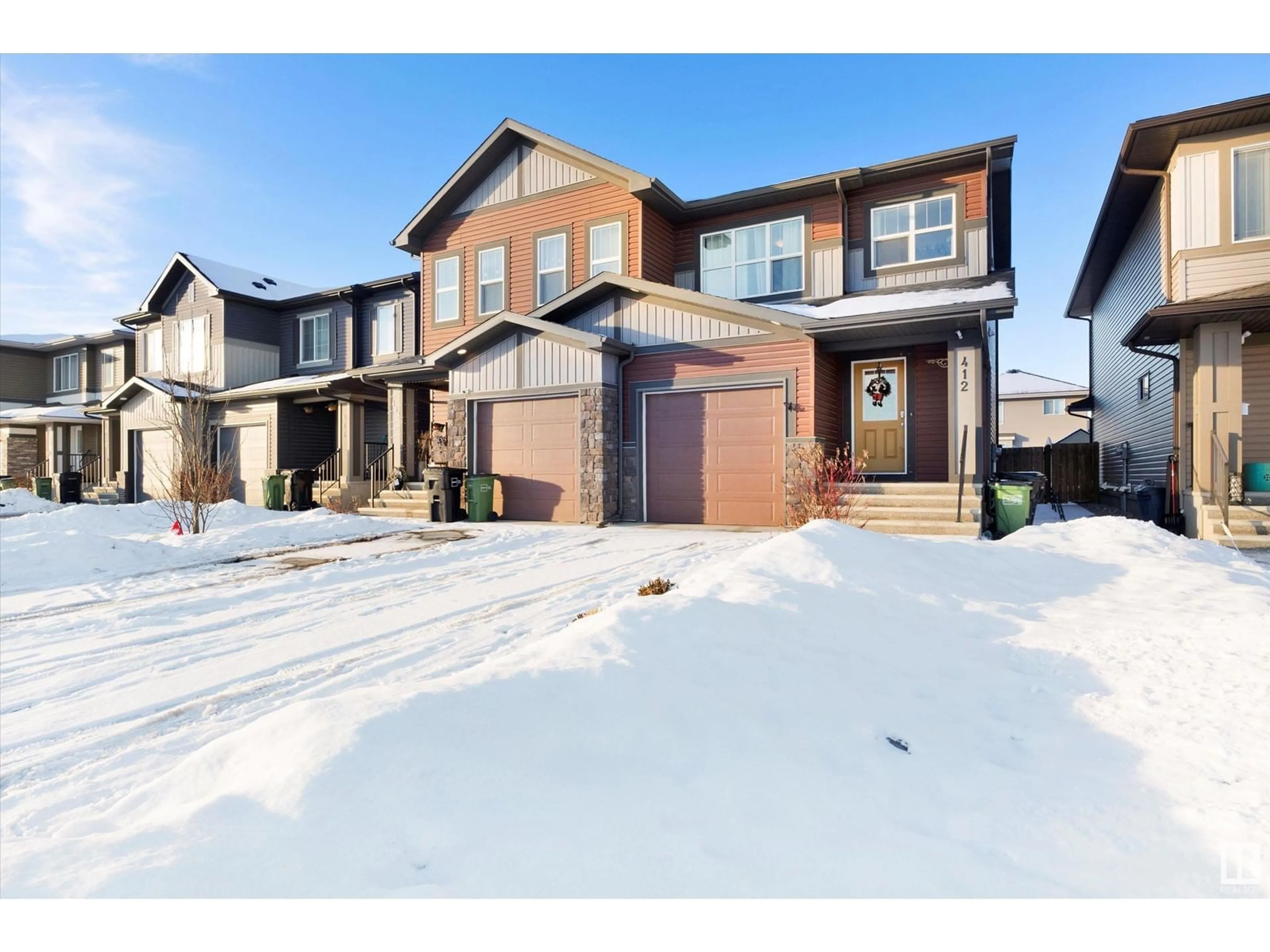 Home with brick exterior material, street for 412 CRYSTALLINA NERA DR NW, Edmonton Alberta T5Z0P3