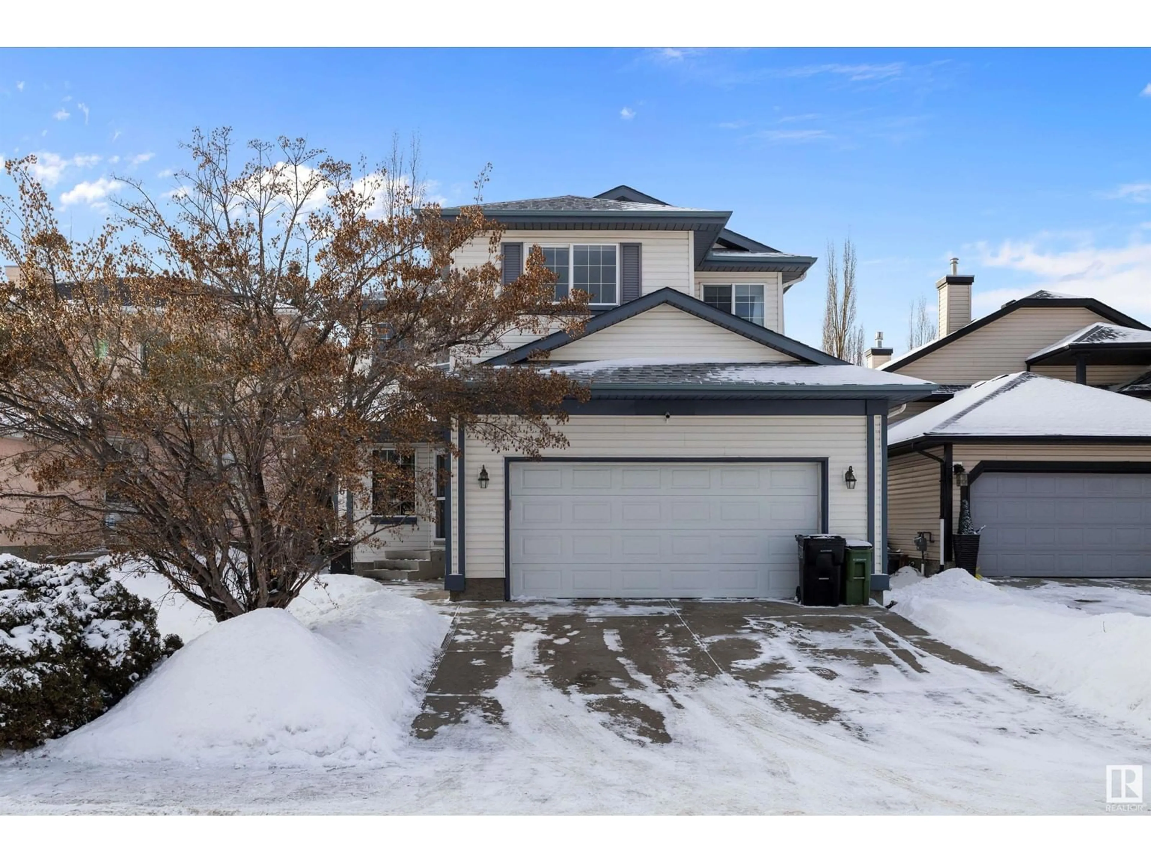 A pic from outside/outdoor area/front of a property/back of a property/a pic from drone, street for 826 BRECKENRIDGE BA NW, Edmonton Alberta T5T6J8