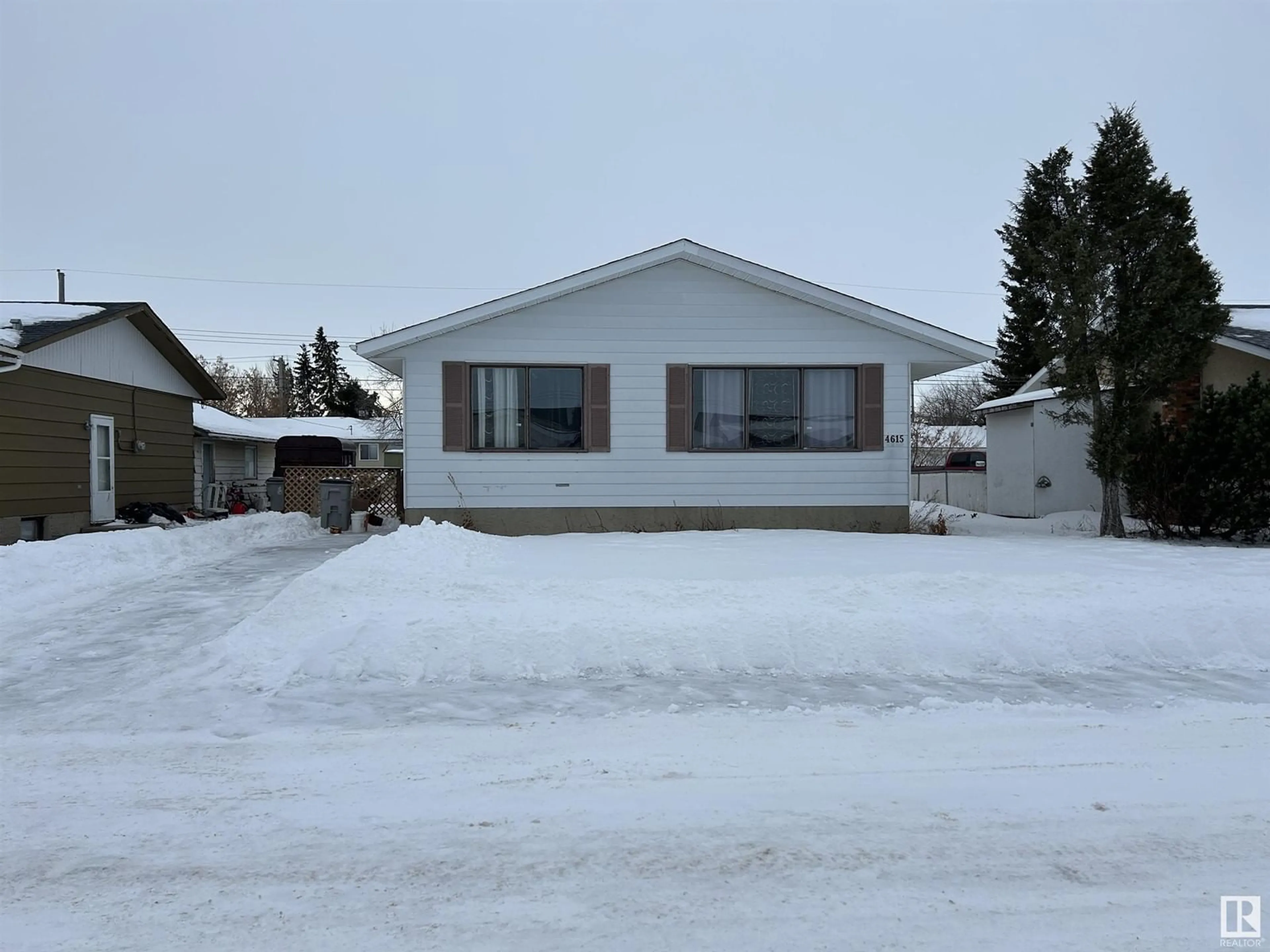 Home with vinyl exterior material, street for 4615 49 AV, Redwater Alberta T0A2W0