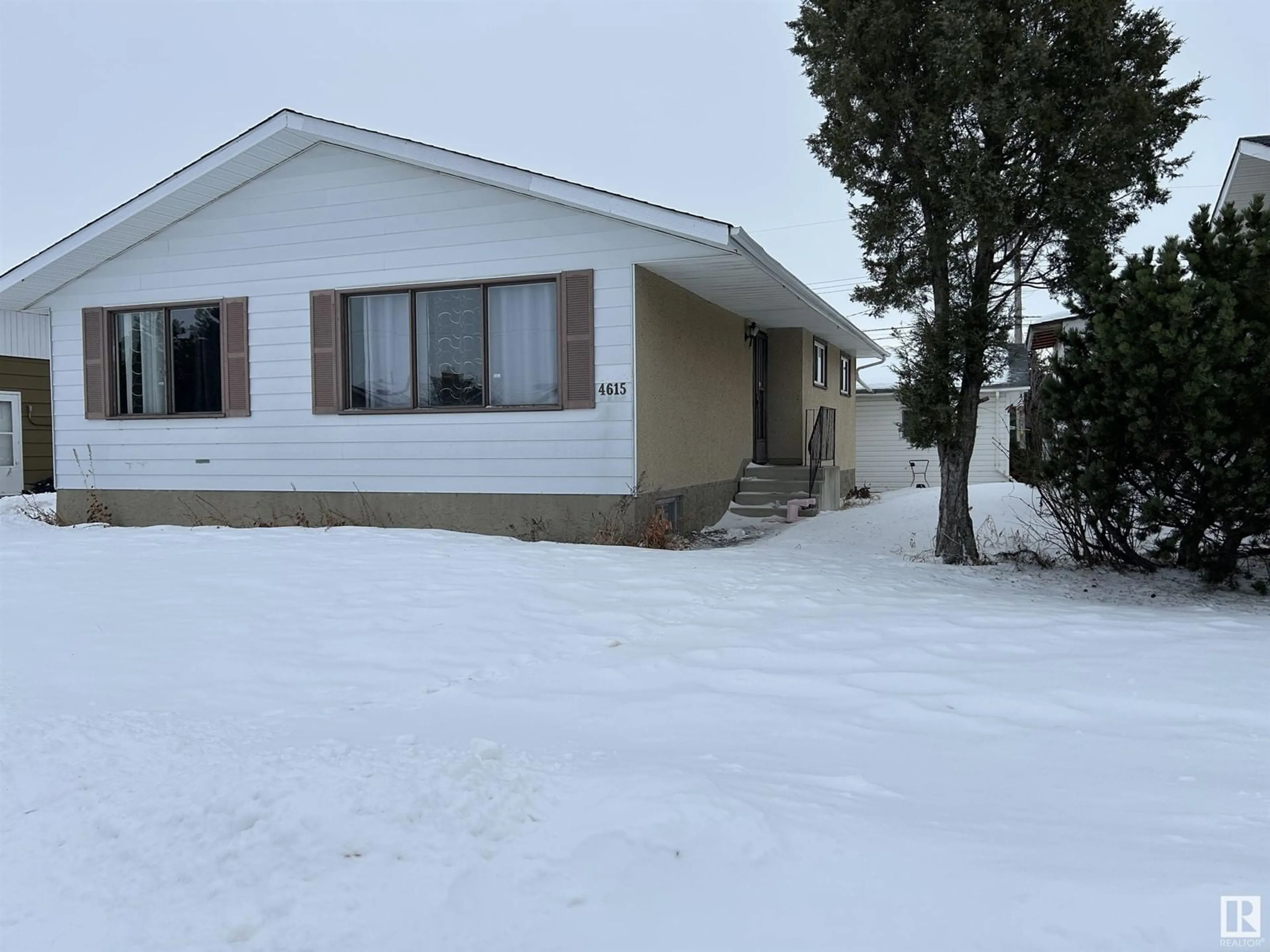 A pic from outside/outdoor area/front of a property/back of a property/a pic from drone, street for 4615 49 AV, Redwater Alberta T0A2W0