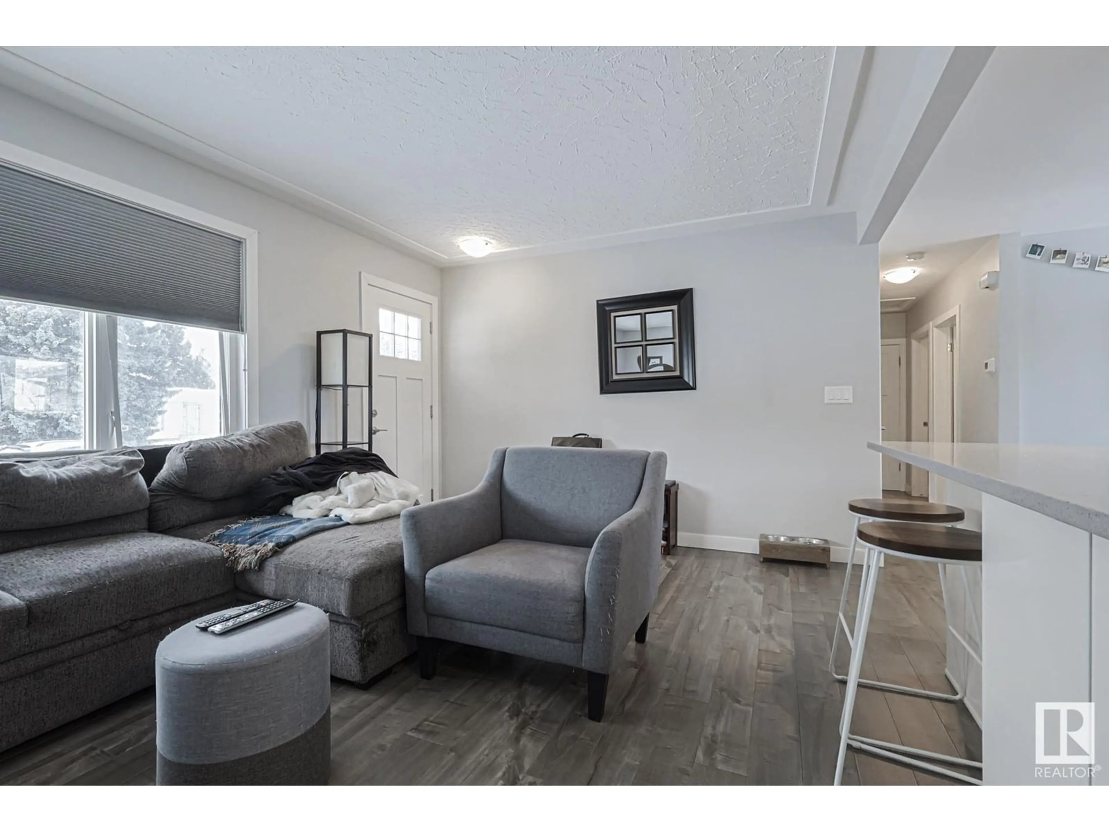 Living room with furniture, unknown for 5808 94A AV NW NW, Edmonton Alberta T6B0Y8