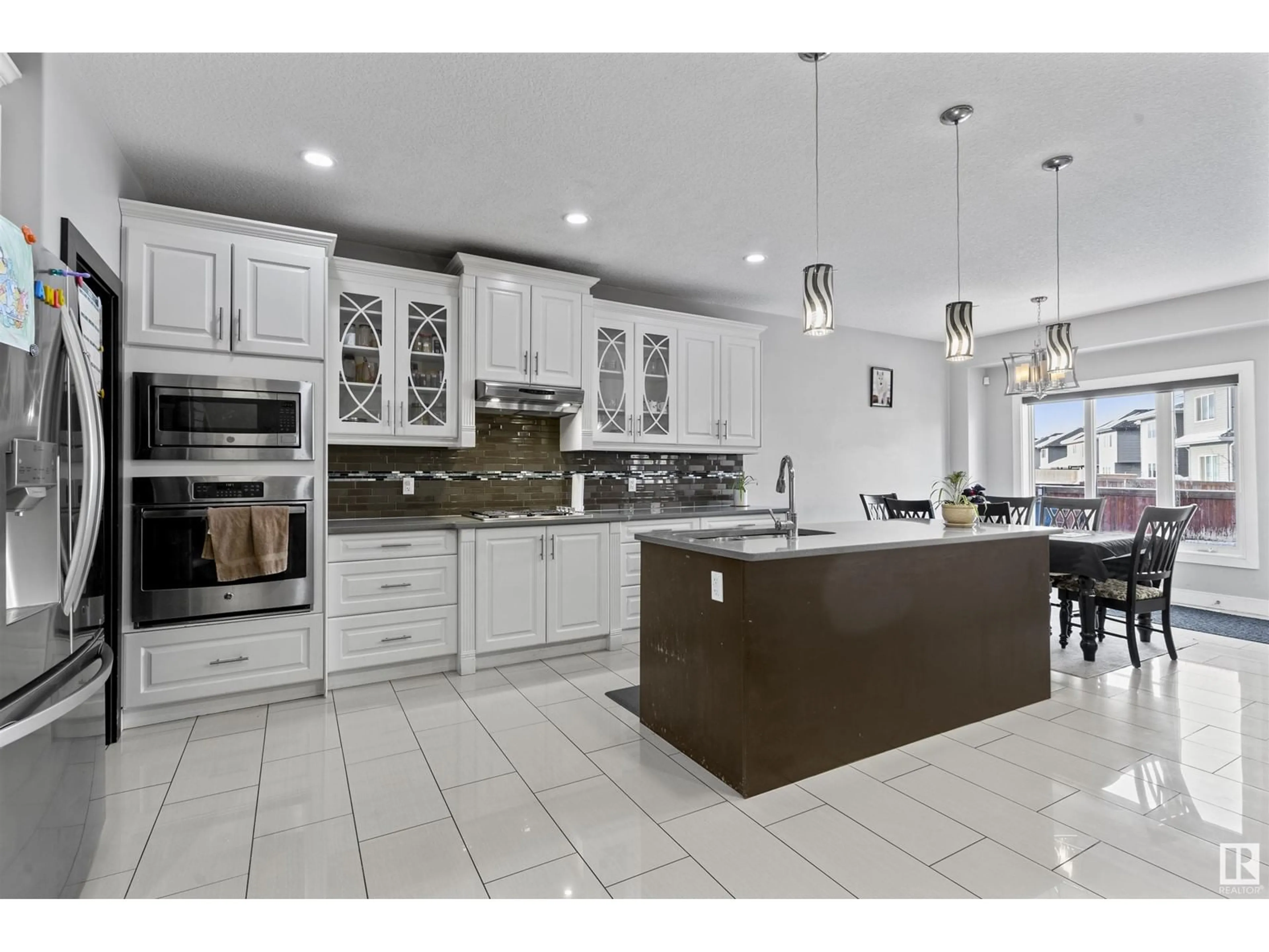 Open concept kitchen, ceramic/tile floor for 5308 RUE EAGLEMONT, Beaumont Alberta T4X0H9