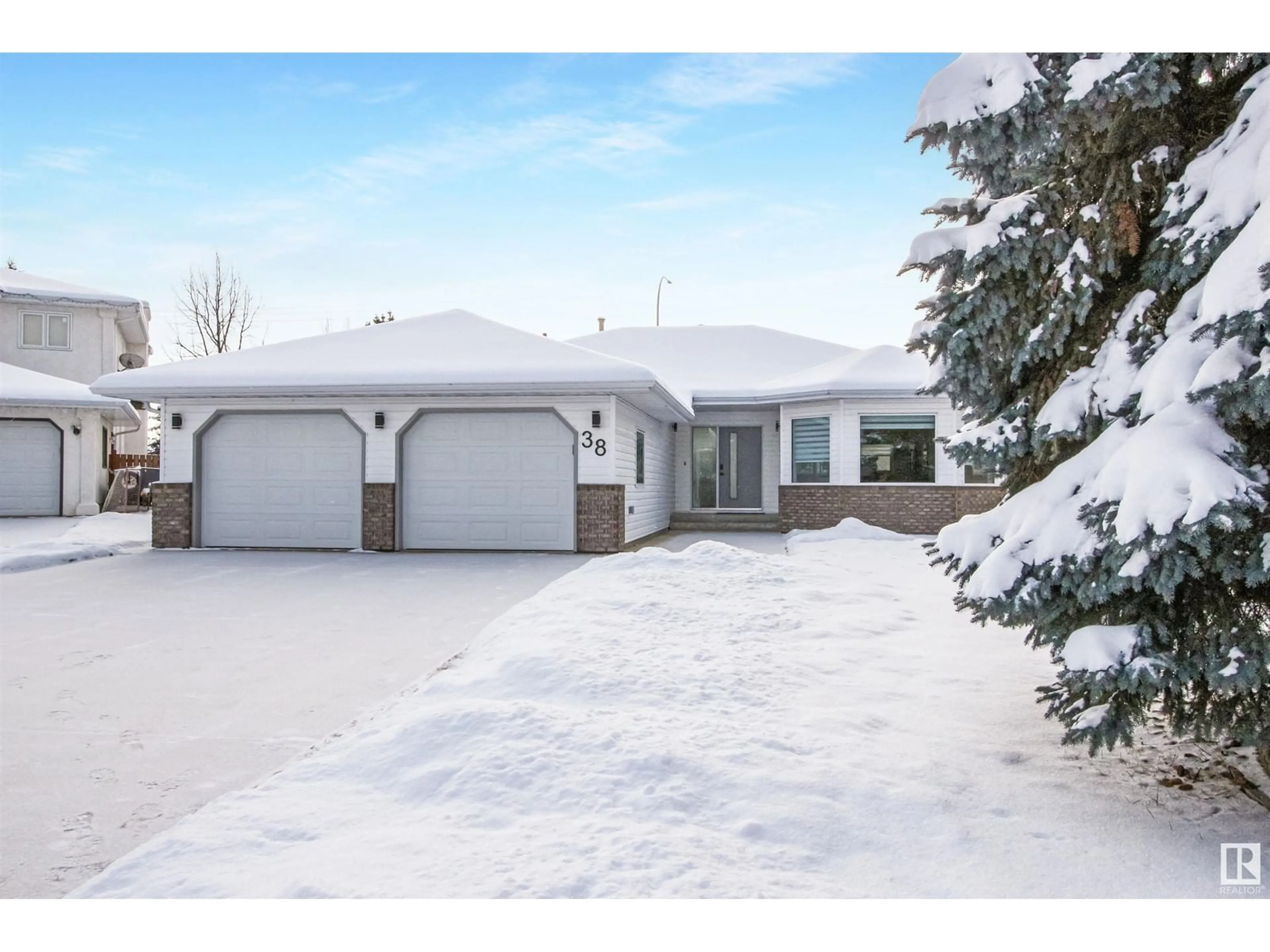 A pic from outside/outdoor area/front of a property/back of a property/a pic from drone, street for 38 HEARTWOOD LN, Stony Plain Alberta T7Z1M1